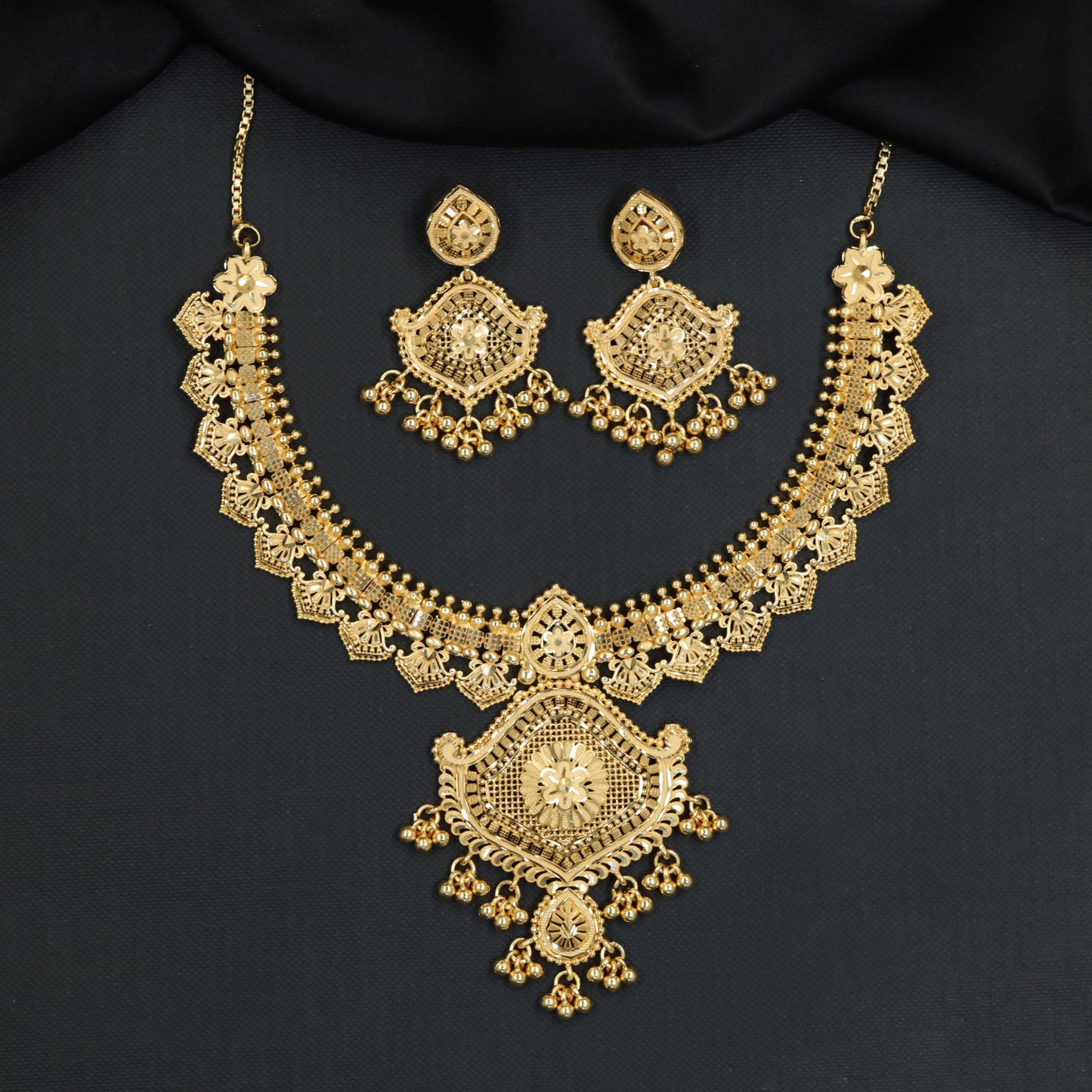 Floral Filigree Forming Necklace with Shield Shaped Centre Pendant
