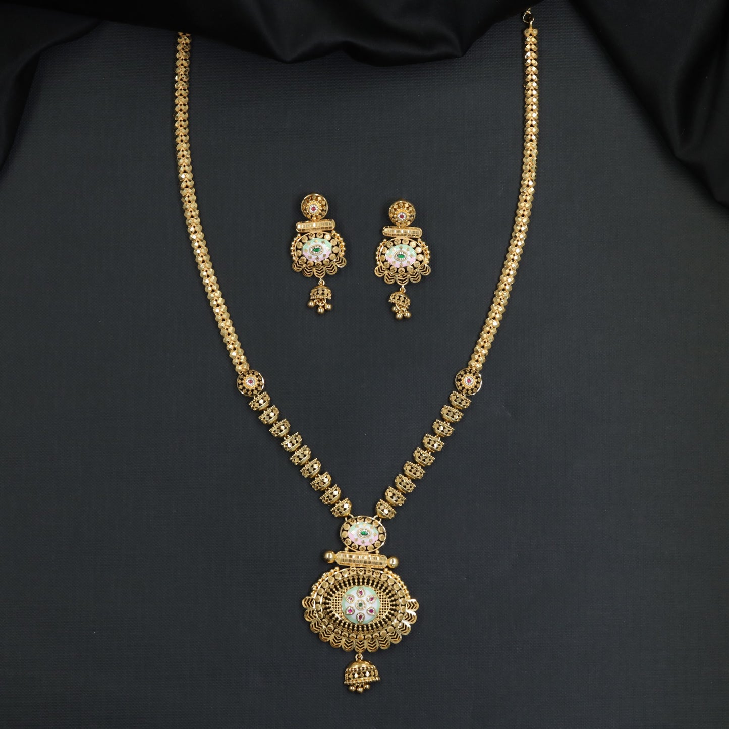 Vintage-inspired Forming Long Haara with Sculpted Circular Panels