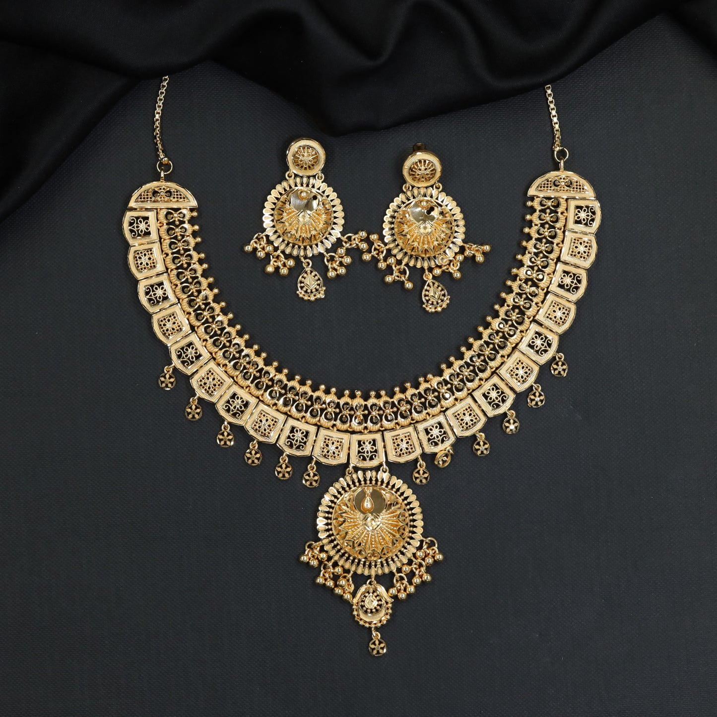 Classic Panel Forming Necklace with Circular Medallion and Drops
