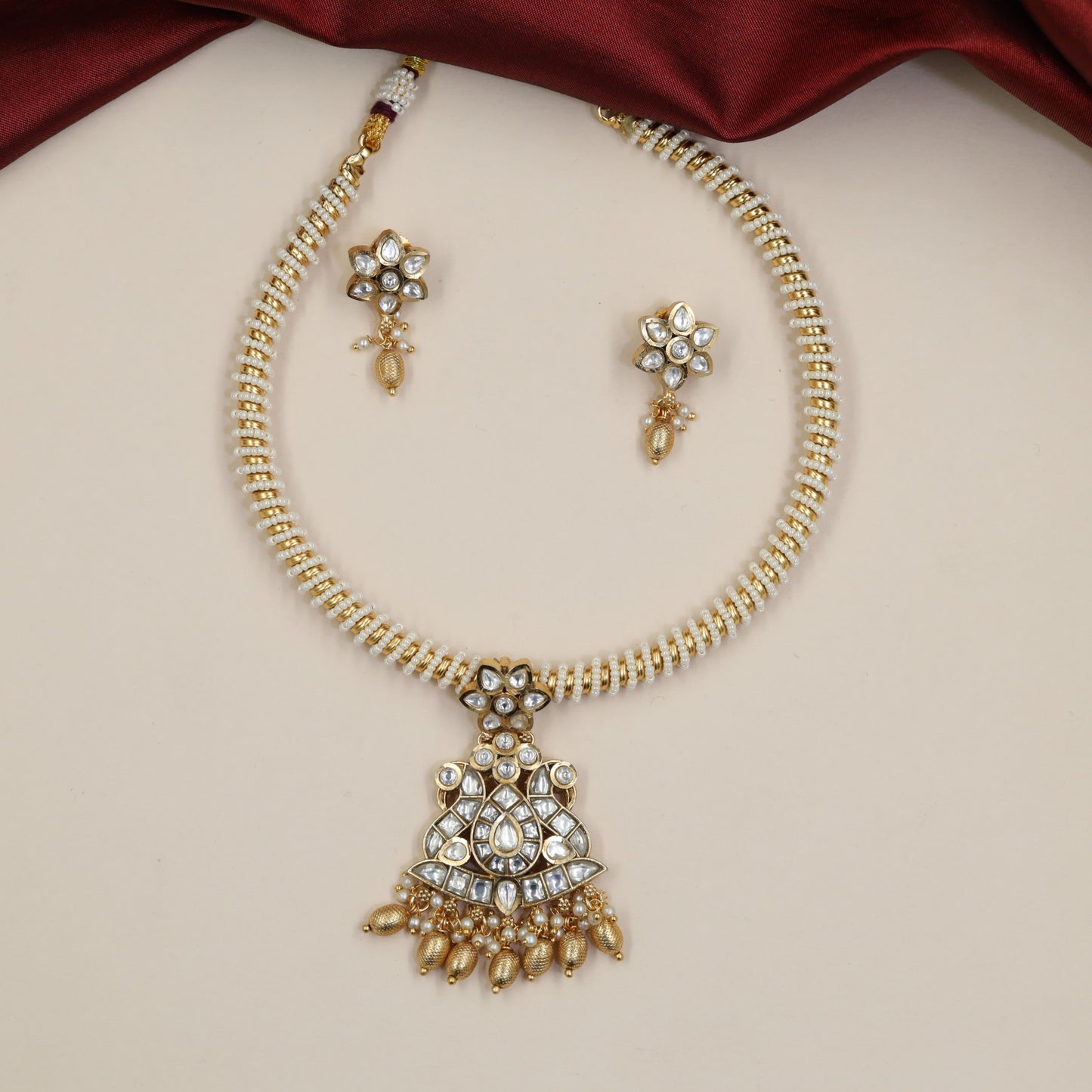 Jadau Necklace with Peacock Centrepiece and Repeating Floral Motifs