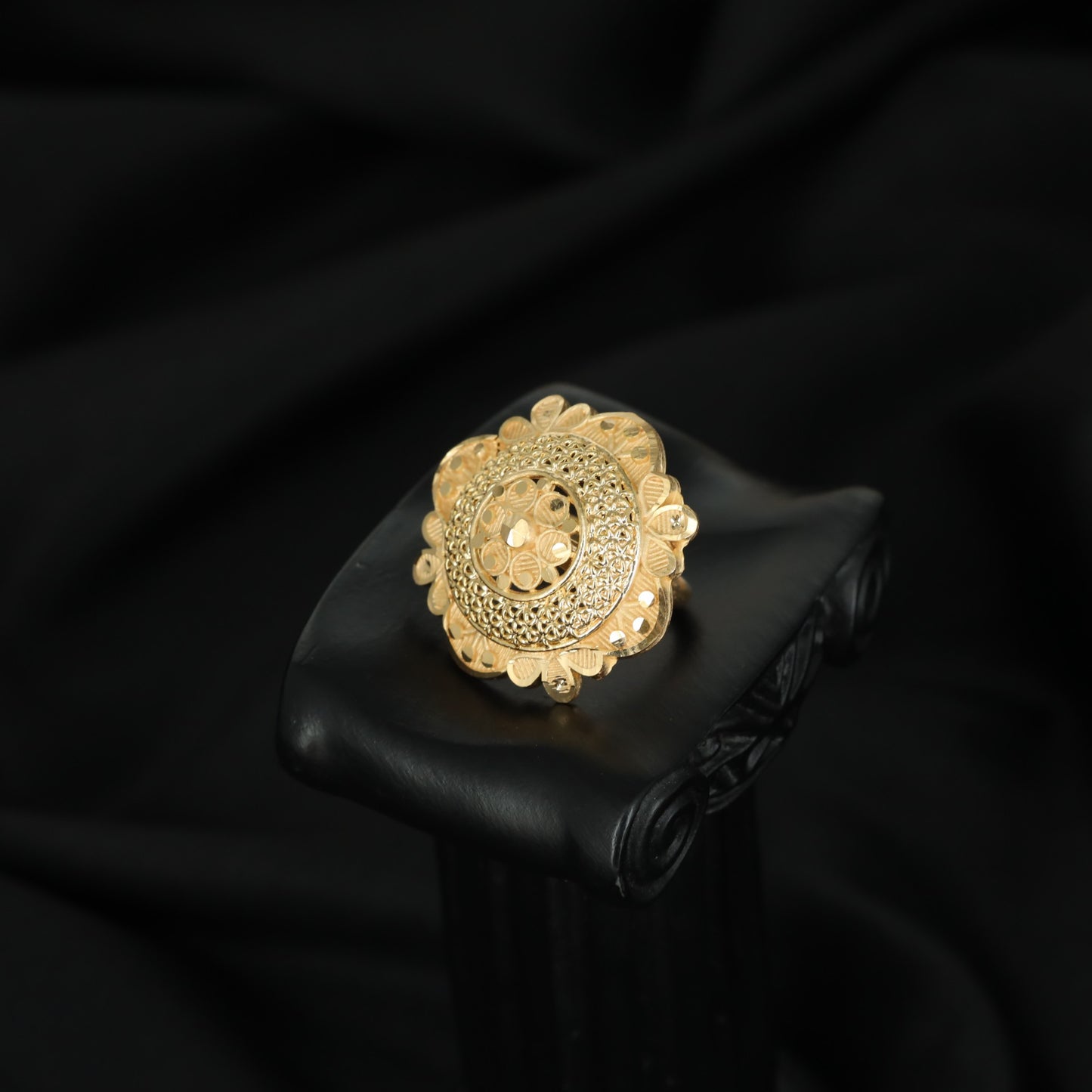 Forming Finger Ring with a Floral Filigree Medallion