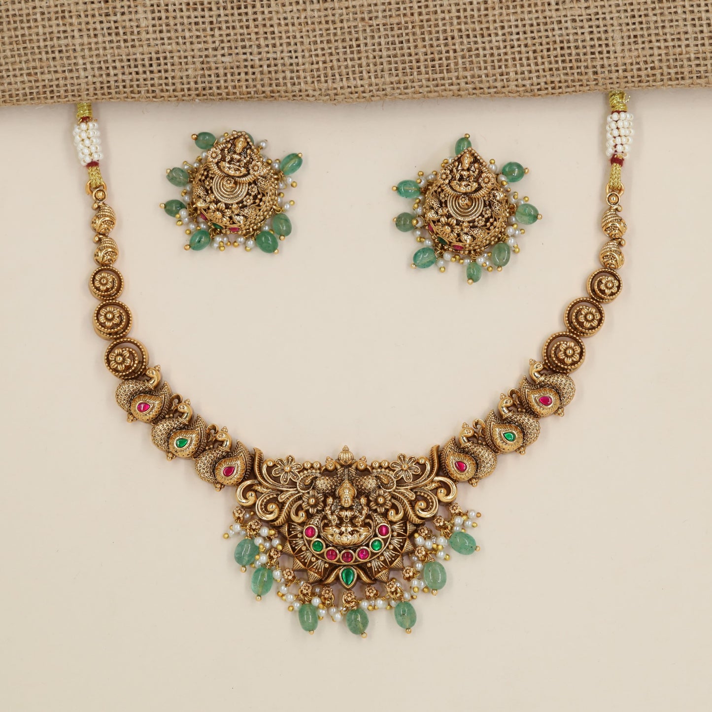 Antique Necklace with Lakshmi Centre Pendant and Repeating Circular Links