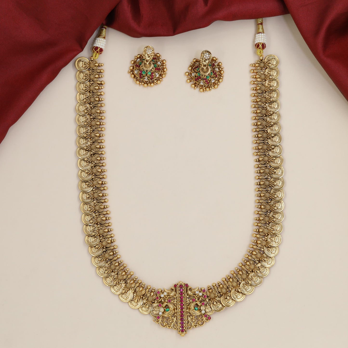 Antique Long Haara with Repeating Peacock Links and Ornamental Centrepiece