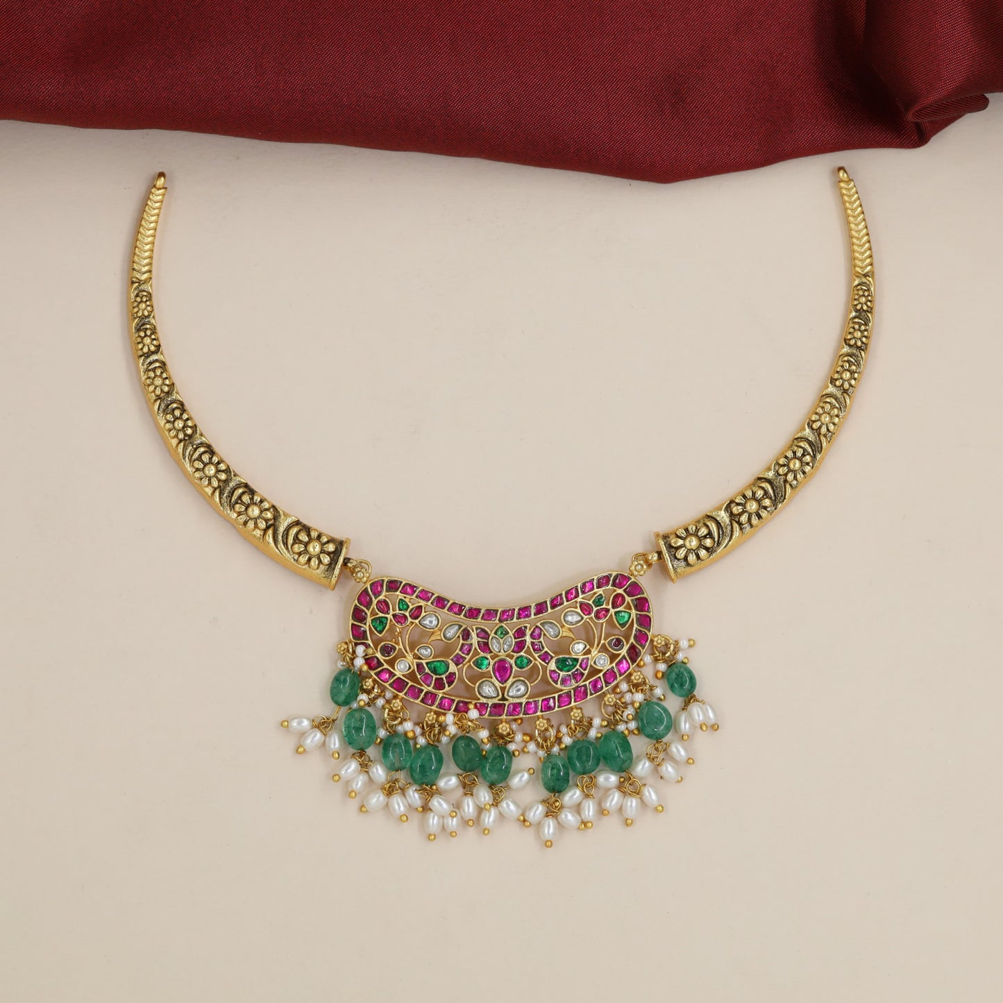Traditional Jadau Necklace with an Arched Centrepiece and Floral Detailing