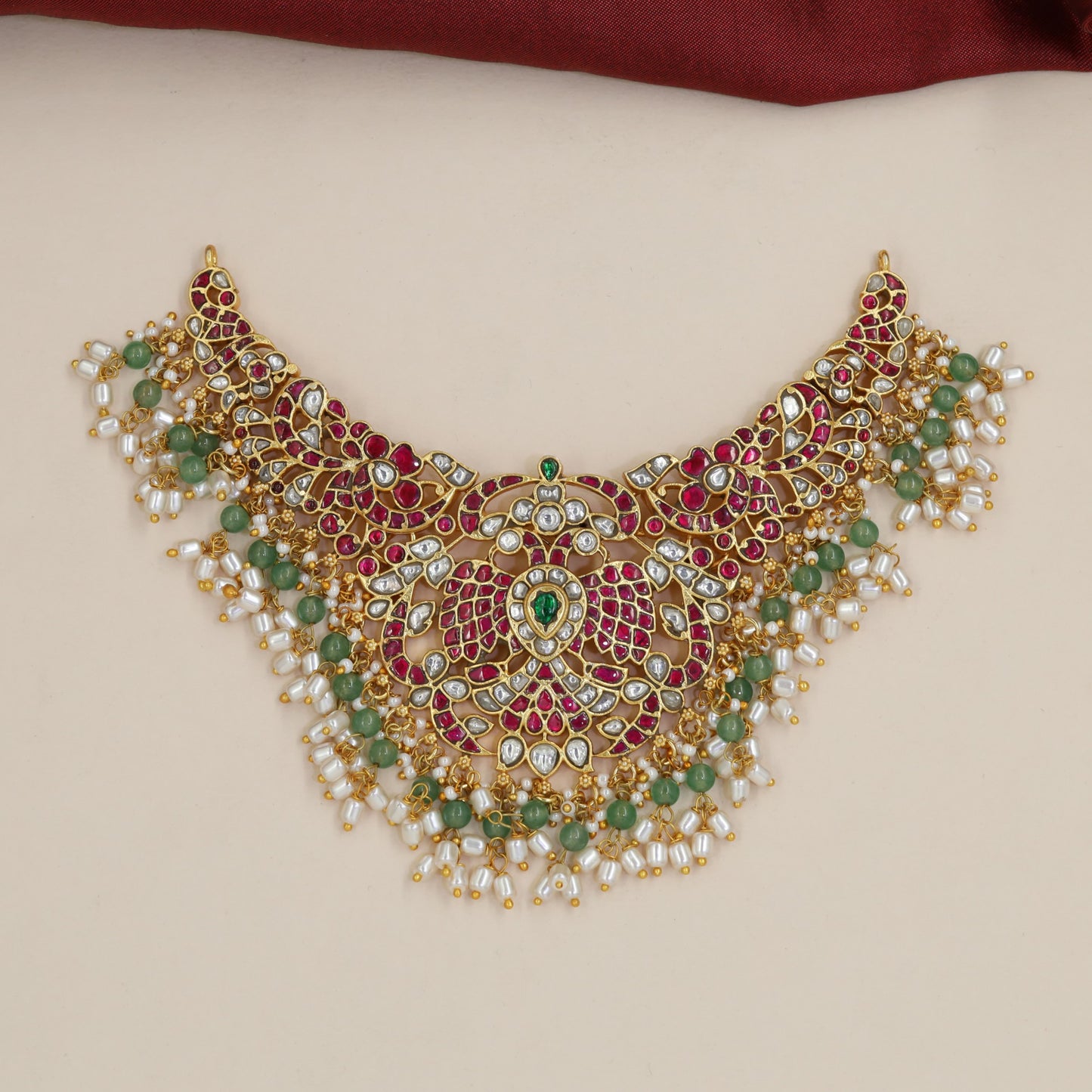 Intricate Floral Linkwork with a Central Jadau Pendant