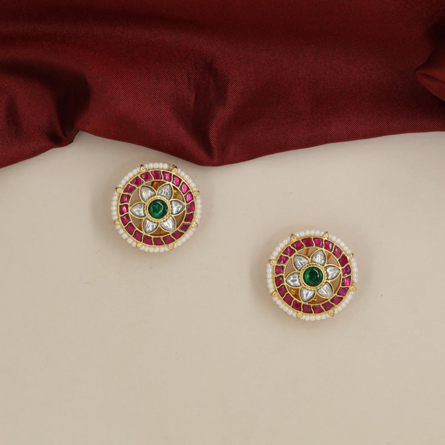 Jadau Studs Showcasing Radial Petals and Intricate Circular Setting
