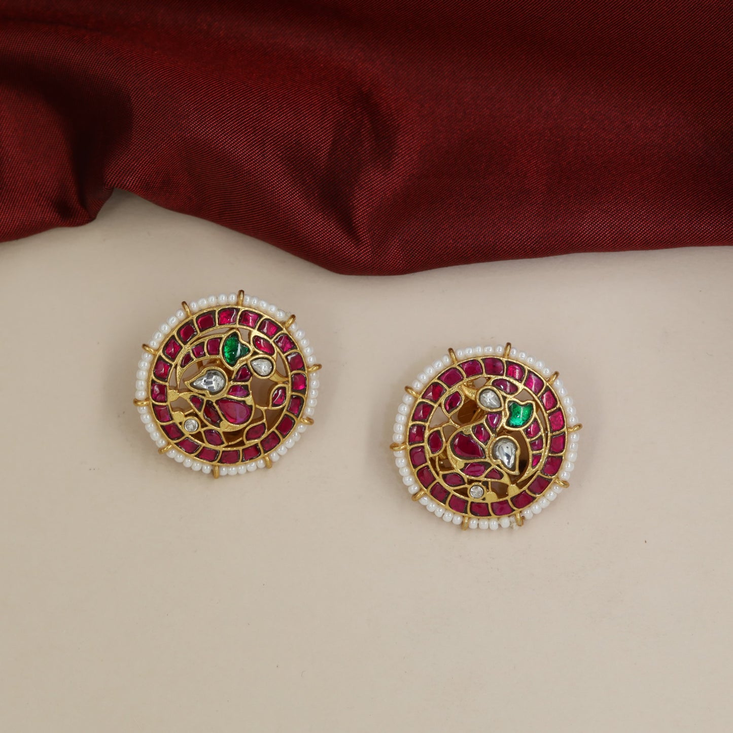 Jadau Studs with Peacock Detailing and Intricate Stone Setting