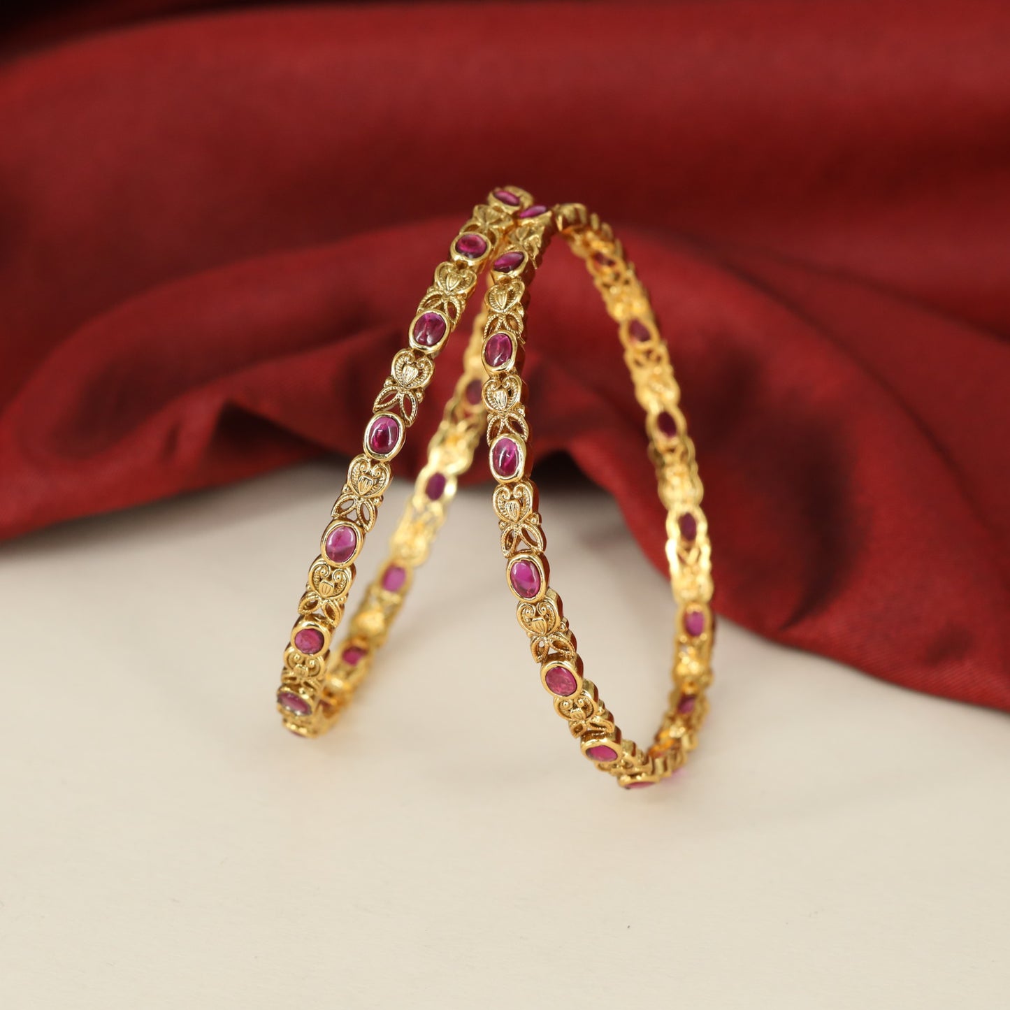 Traditional Bangles Showcasing Repeating Paisley Links and Fine Ornamental Work