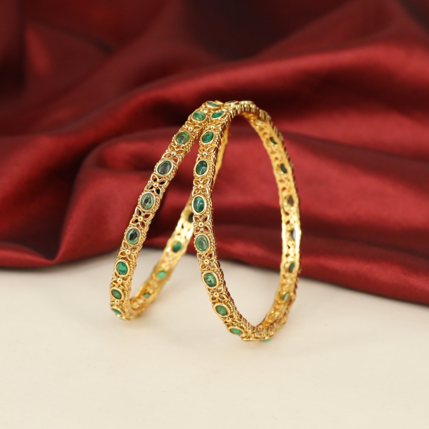 Couture Antique Bangles featuring sculpted scrollwork and oval accents