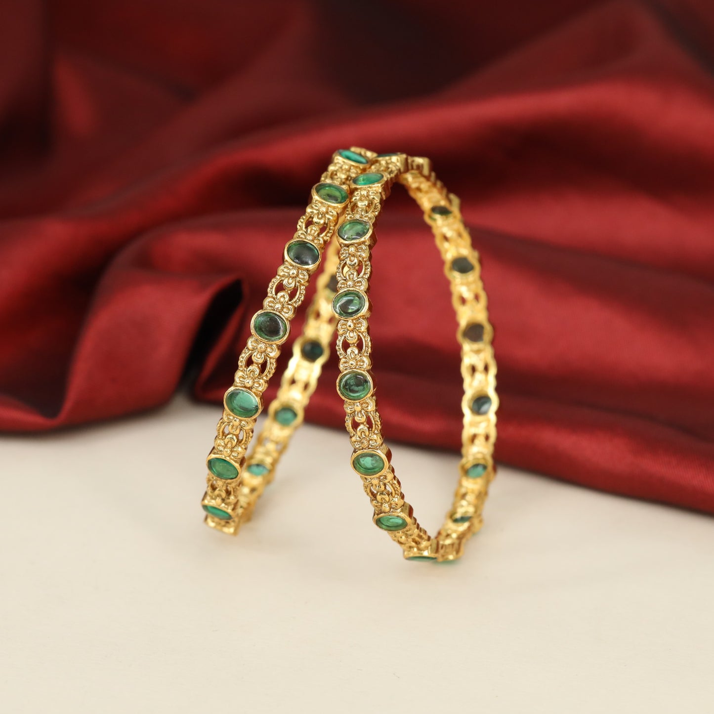 Heritage Antique Bangles with intricate openwork and repeating oval elements