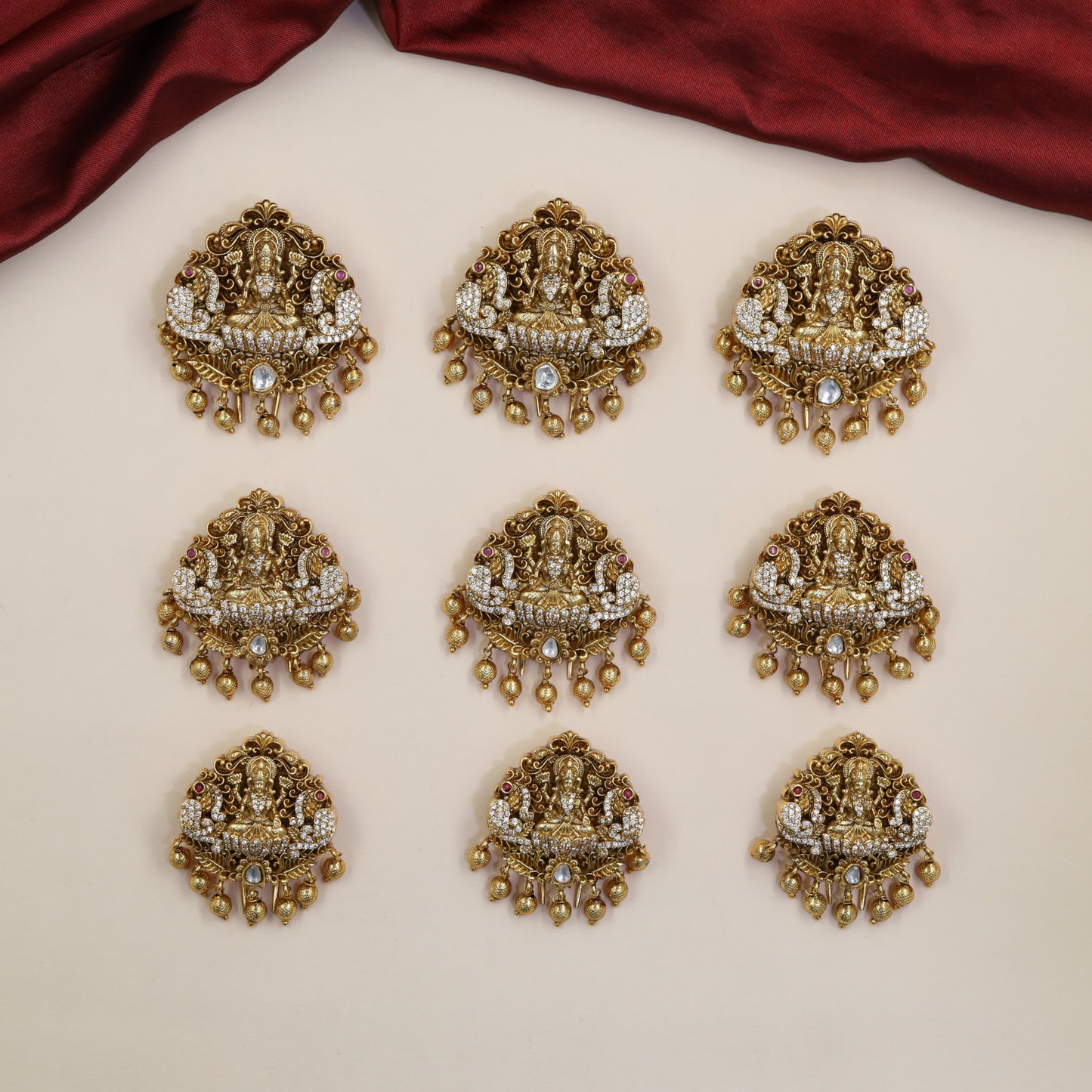Couture Lakshmi Antique Jade Bille with intricate arches and hanging drops