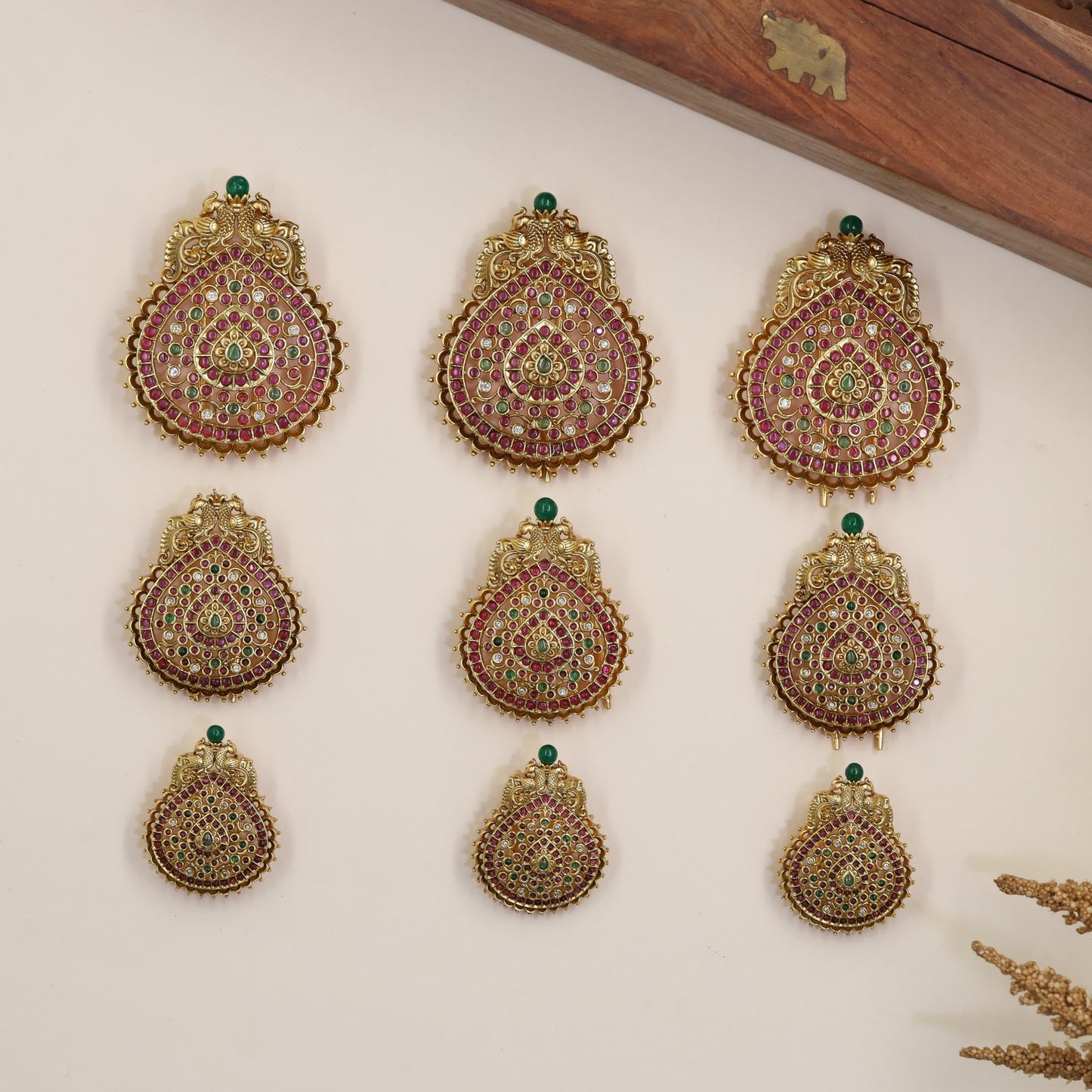 Teardrop Peacock Antique Jade Bille with radial detailing and sculpted edging