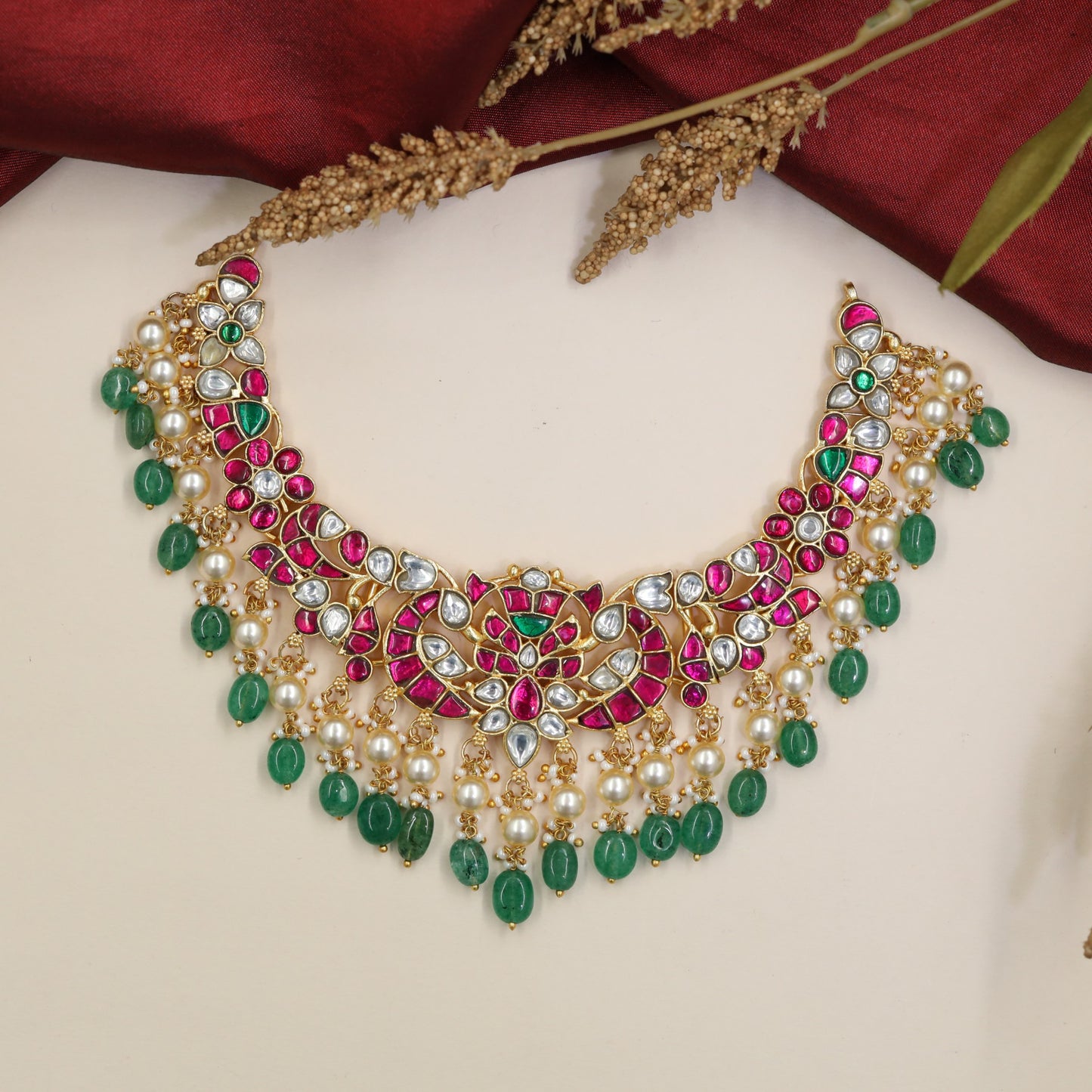Grand Jadau Necklace with a decorative floral centre and ornate side links