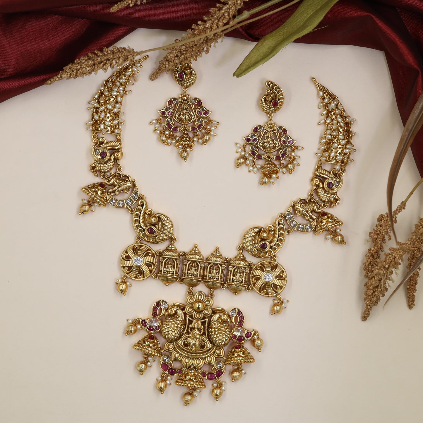 Traditional Lakshmi Antique Necklace with sculpted peacocks and hanging beads