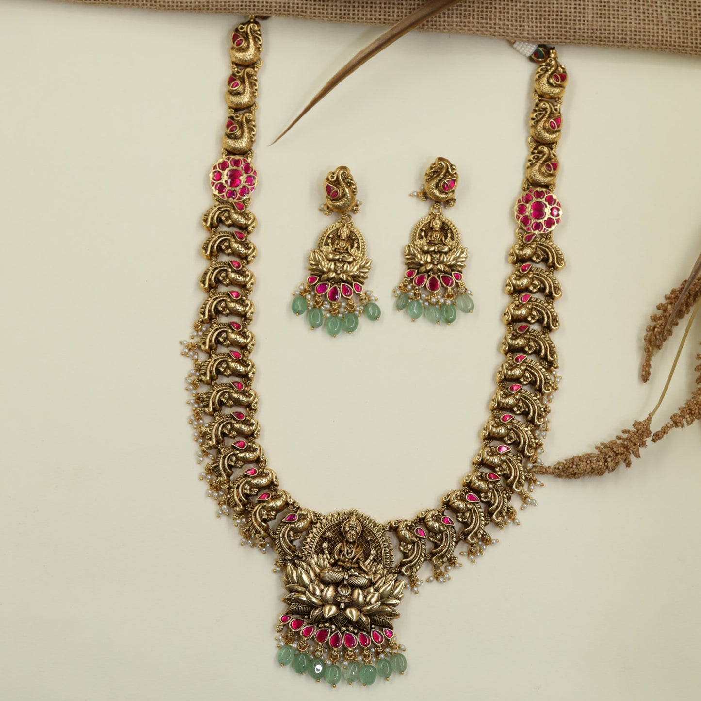 Lakshmi Long Haara with Floral Medallion Inserts and Lotus Pendant Detailing