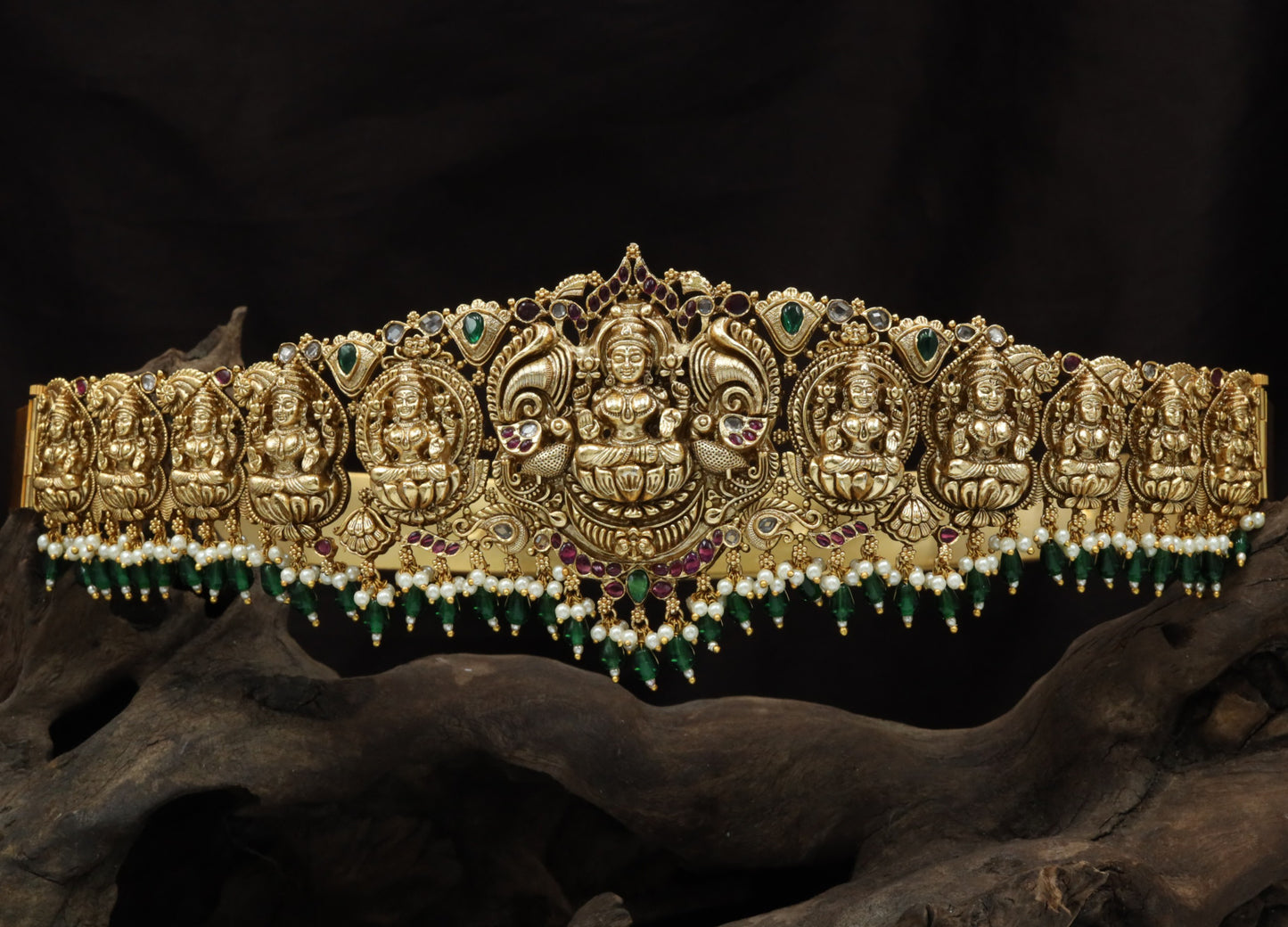 Temple Inspired Antique Dabu With Repeated Lakshmi Relief And Decorative Fringe