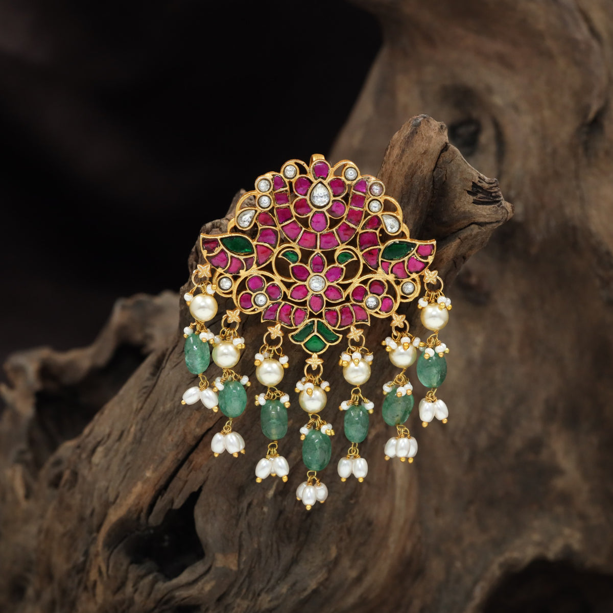 Distinctive Jadau Pendant Showcasing Peacocks, Floral Detailing And Ornamental Drops