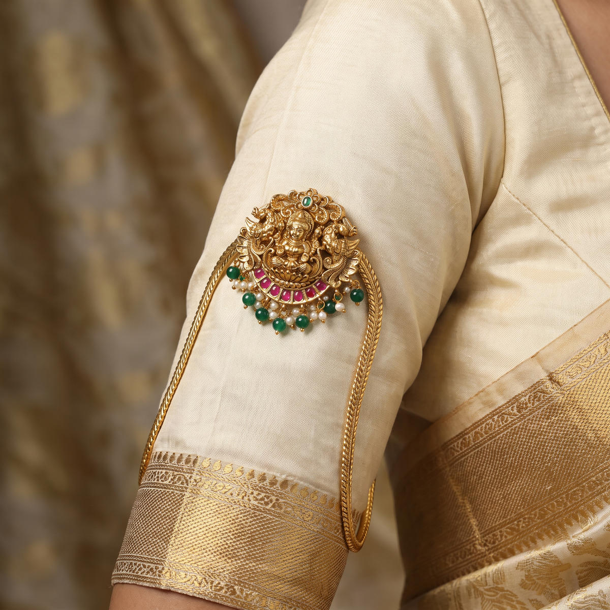 Traditional Vanki with a detailed Lakshmi panel, ornate scrollwork and graceful drops