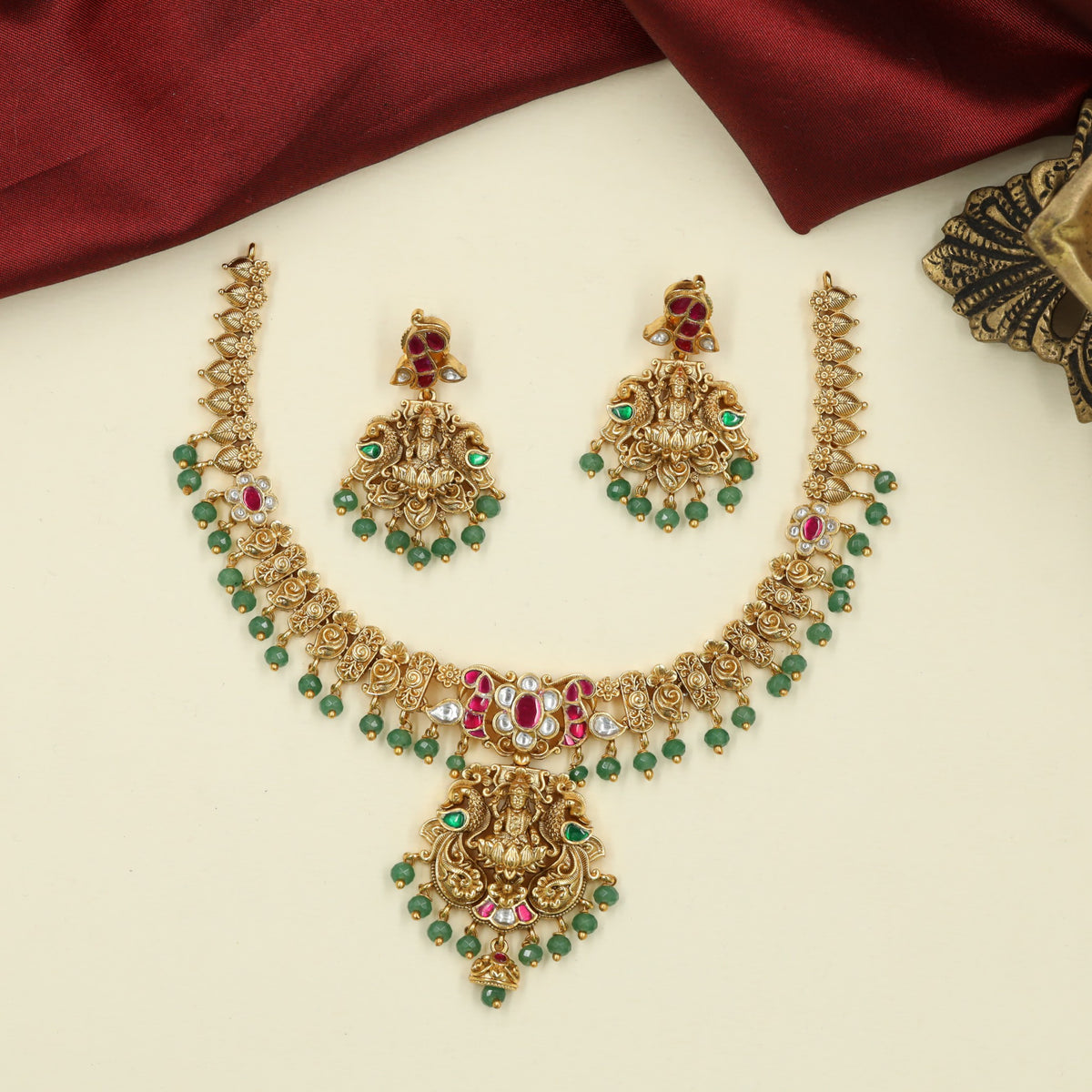 Richly Crafted Antique Necklace featuring Sculpted Lakshmi and Fine Floral Ornamentation