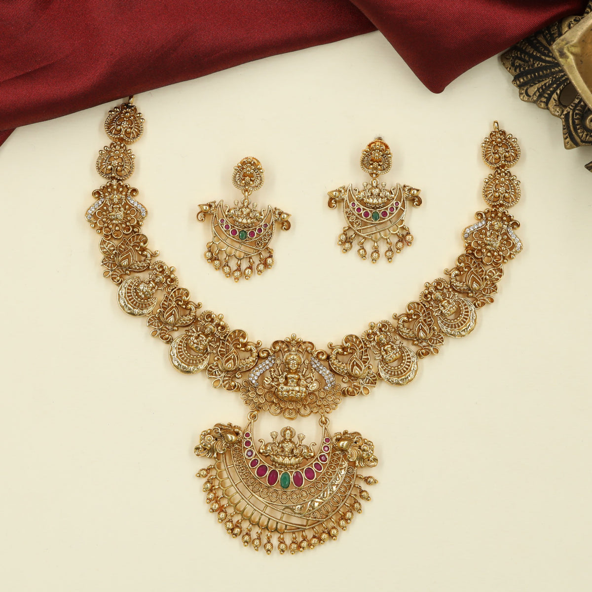 Classic Antique Necklace with Sculpted Lakshmi Detailing and Symmetrical Floral Panels