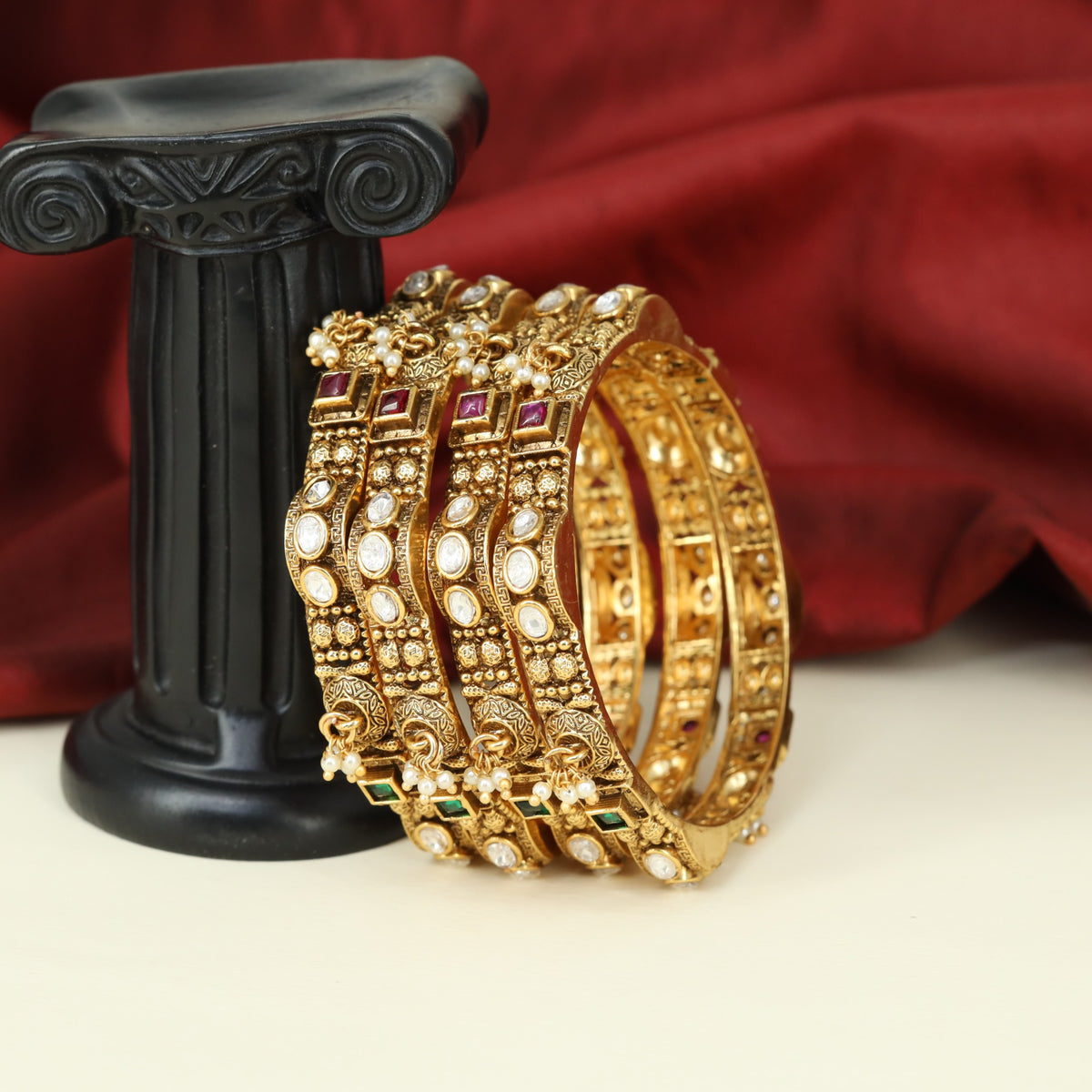 Richly Detailed Bangles with Floral Engraving and Graceful Pearl Accents