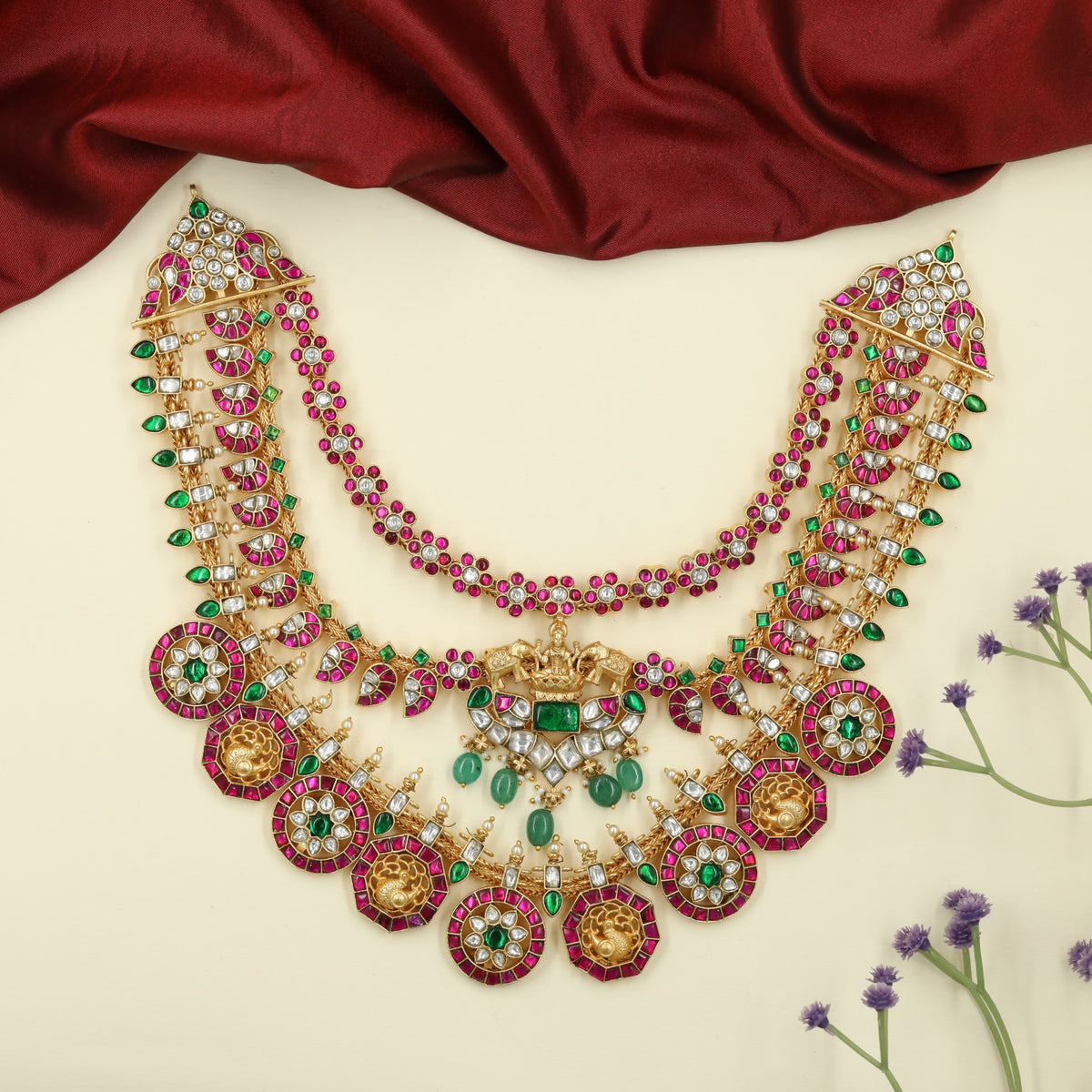 Richly Crafted Jadau Necklace with Repeating Disc Motifs and Pendant Detailing