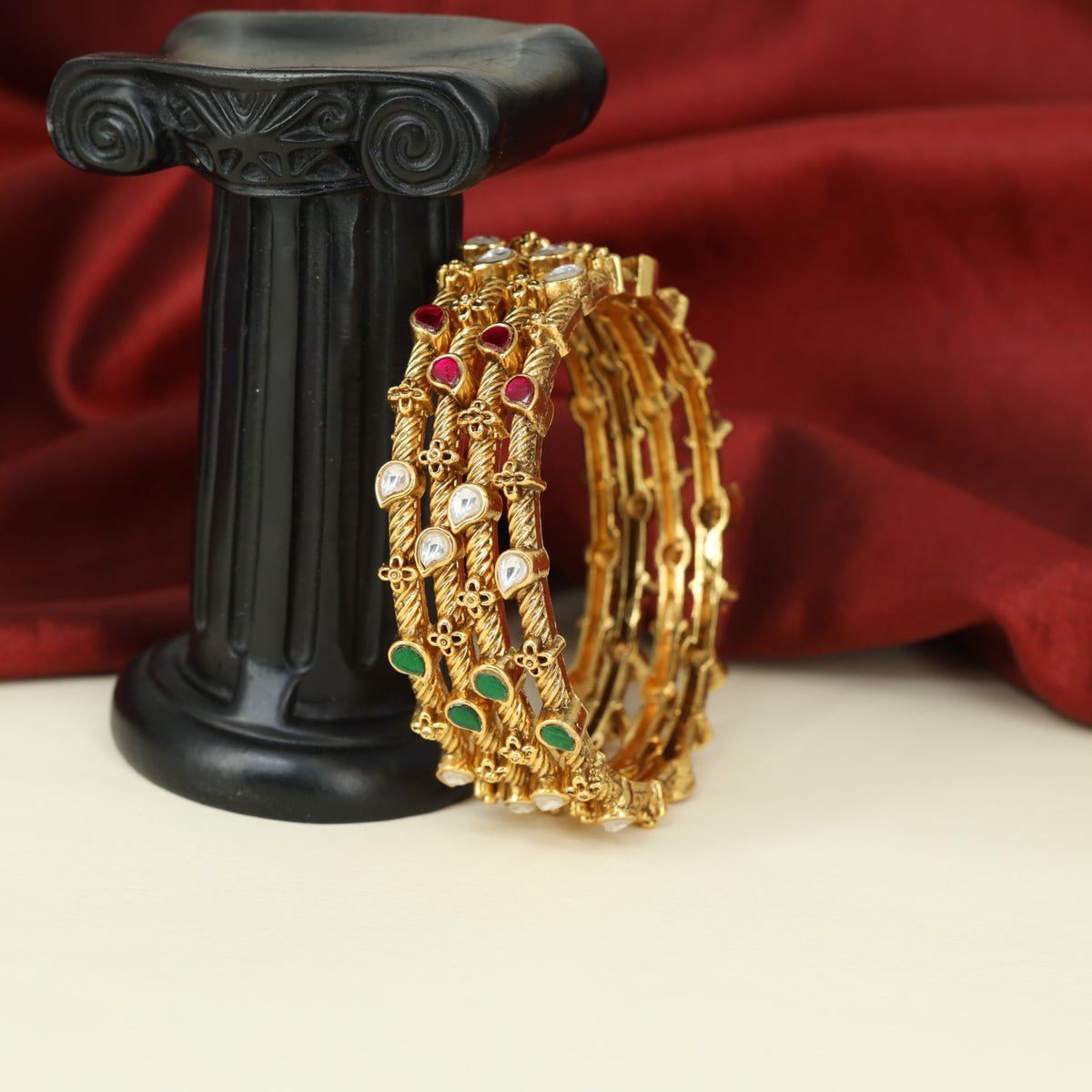 Antique Bangles with Repeated Teardrop Elements and Delicate Raised Work