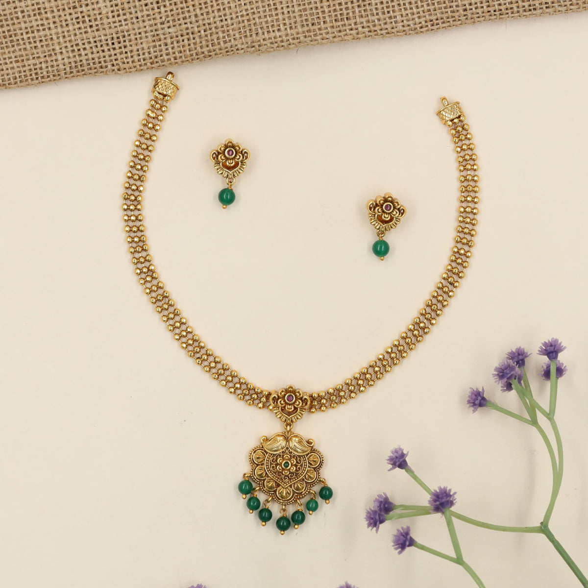 Antique Necklace with Delicate Floral Motifs and a Detailed Hanging Pendant