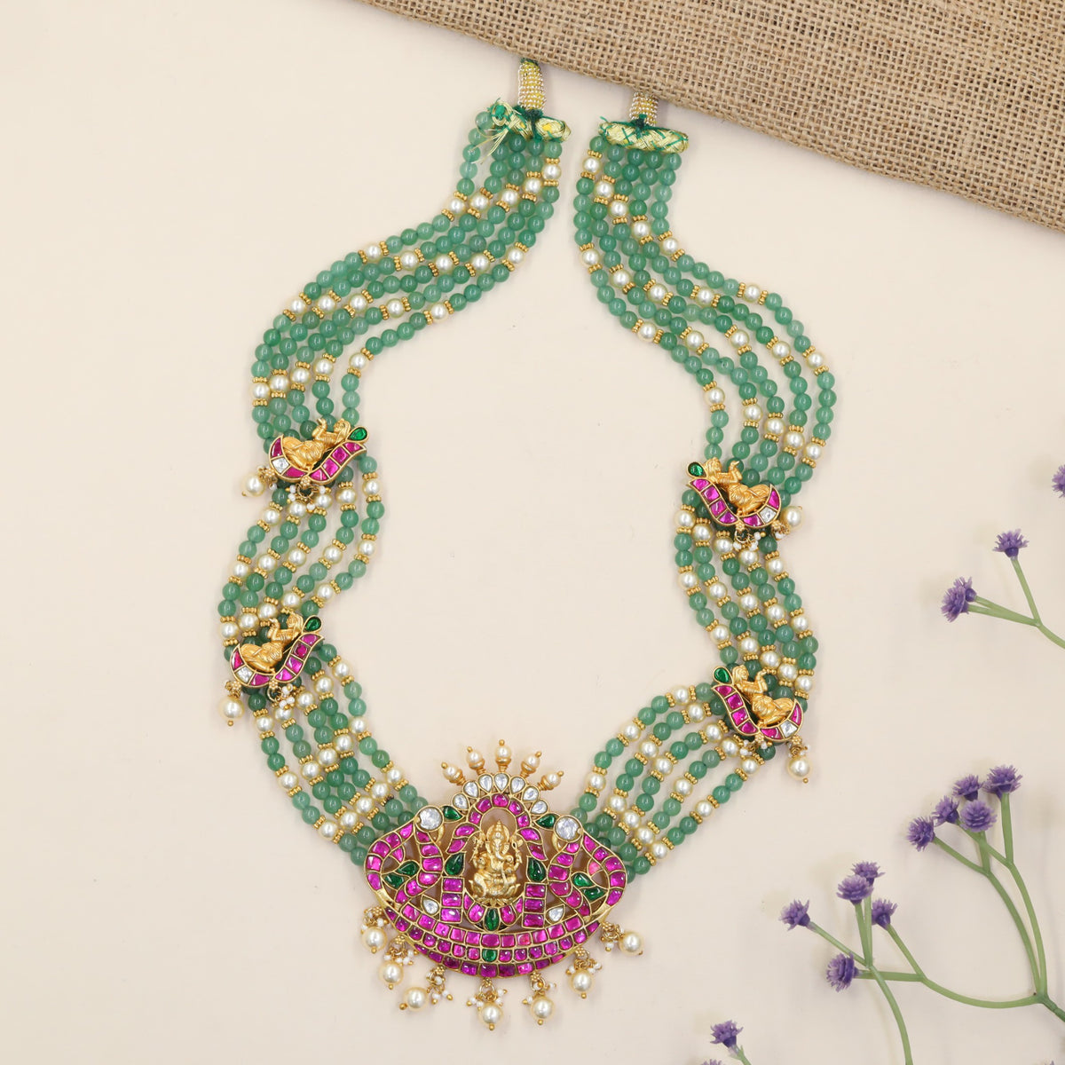 Jadau Beads Long Haara with Elaborate Ganesha Pendant and Decorative Side Elements