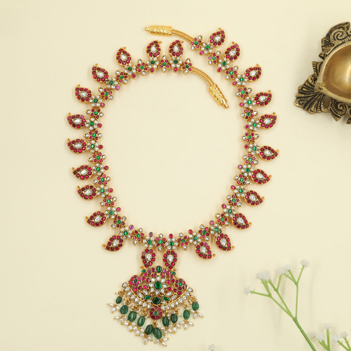 Jadau Long Haara featuring peacock accents and hanging drops