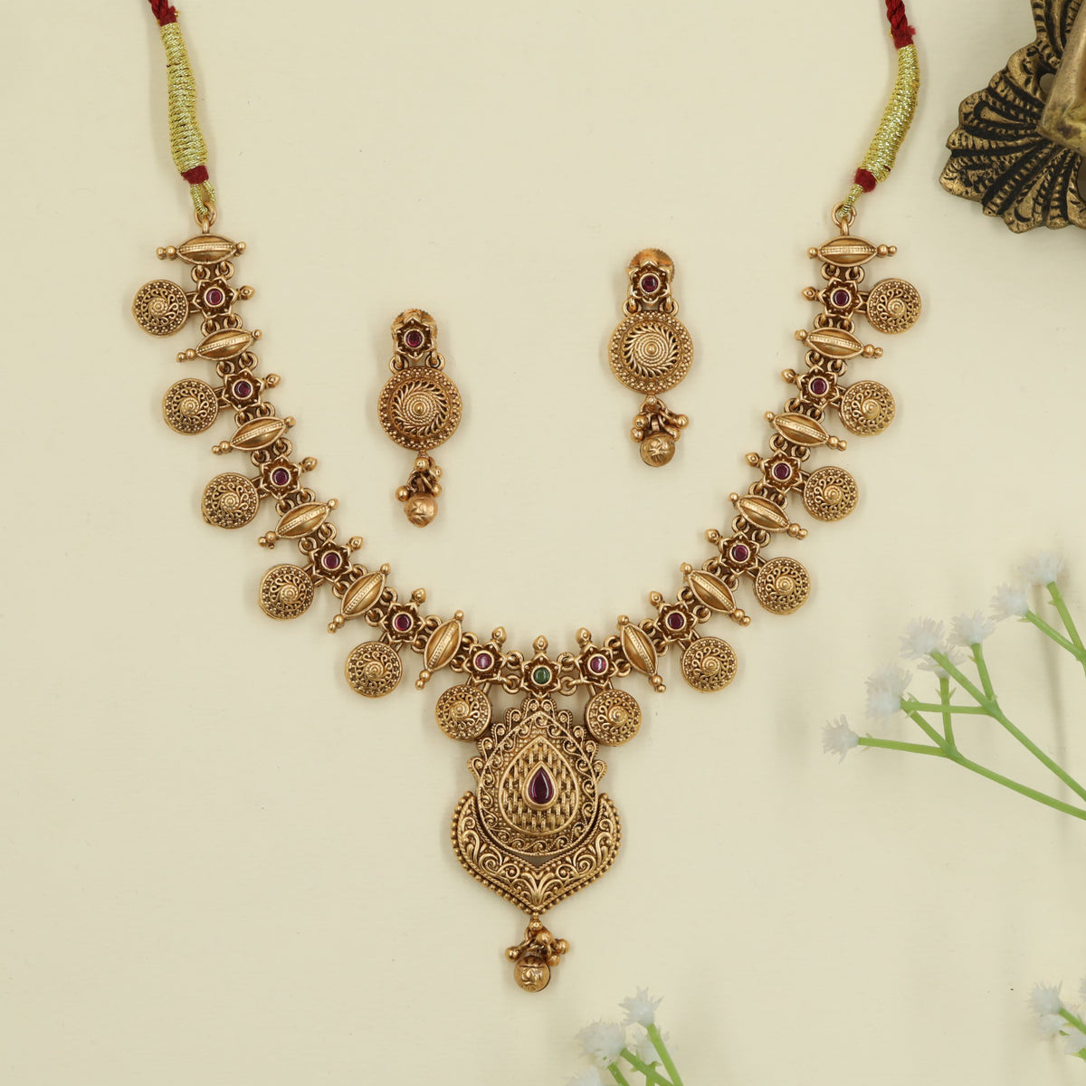 Antique Necklace with circular medallion detailing and a statement pendant