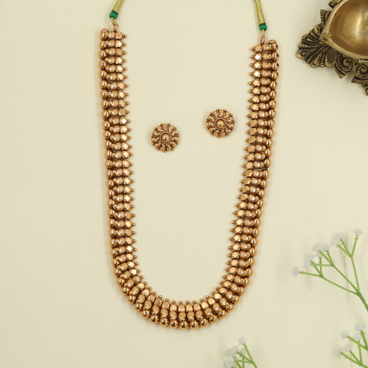 Premium antique long haara adorned with structured bead detailing