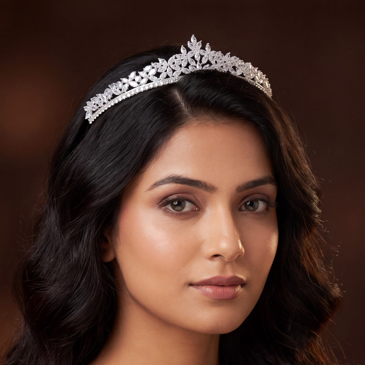 Floral crystal crown with delicate leaf clusters and a graceful symmetrical design