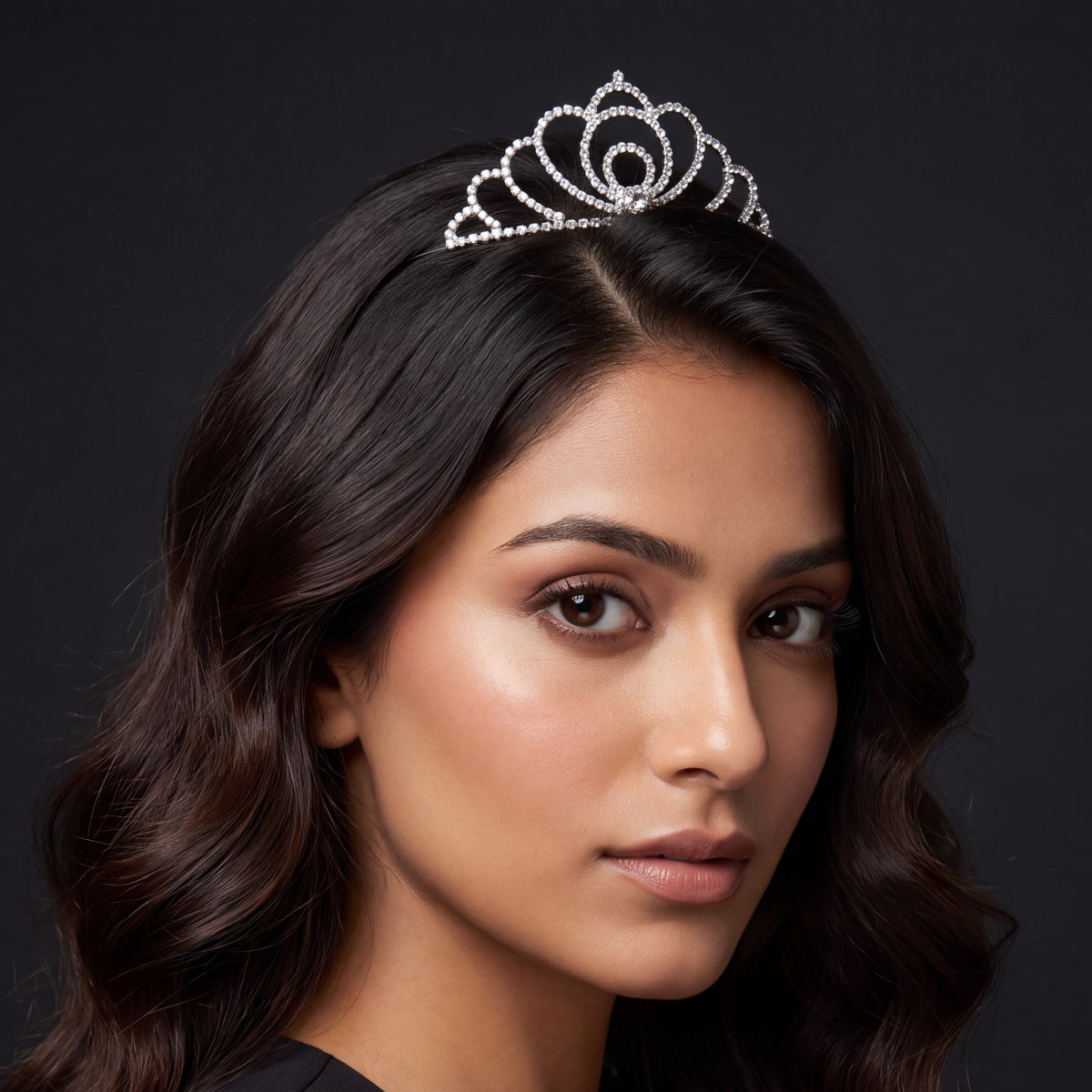 Elegant statement crown with sweeping petal inspired arches and a circular centre
