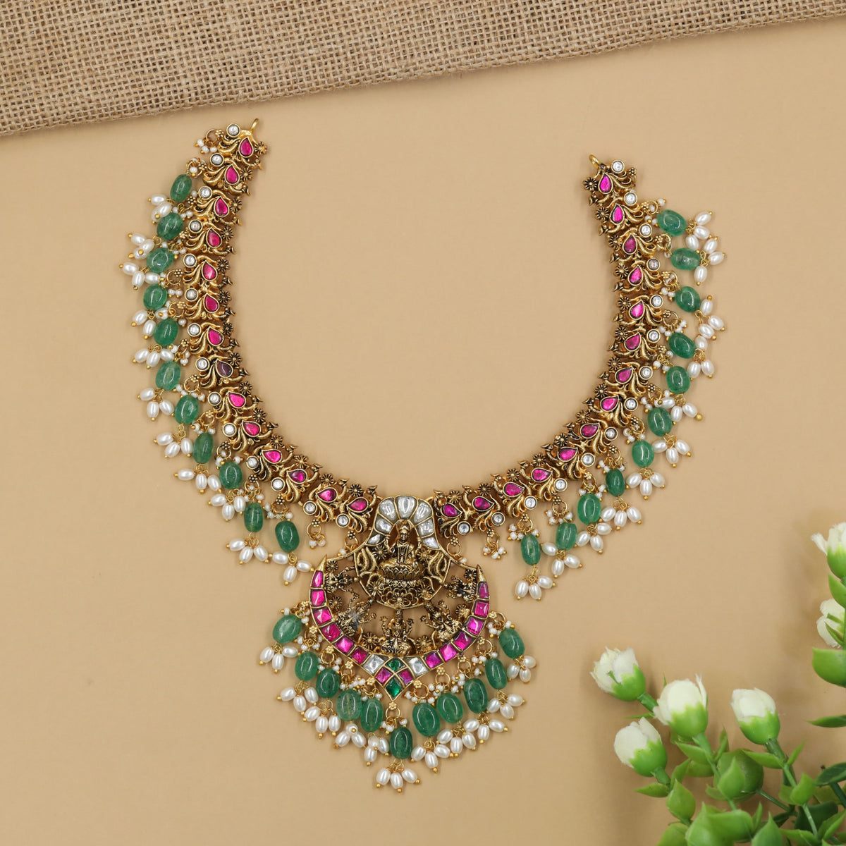 Festive Jadau Necklace Designed With A Richly Detailed Centrepiece