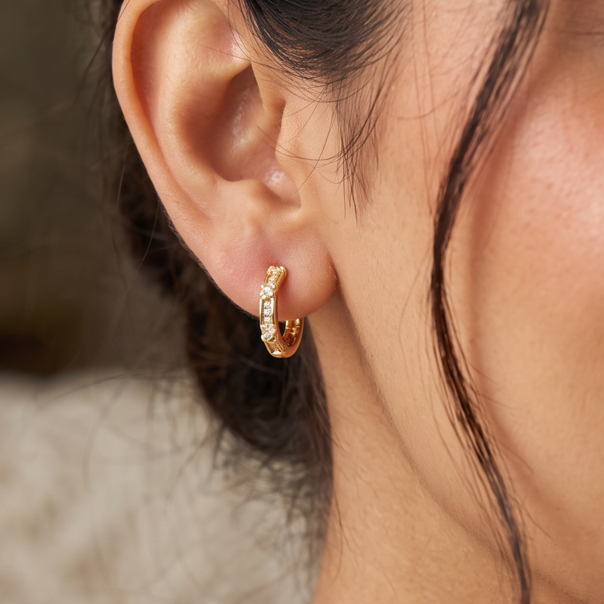 A Delicate Gold Polish Bali with a Sleek Embellished Profile