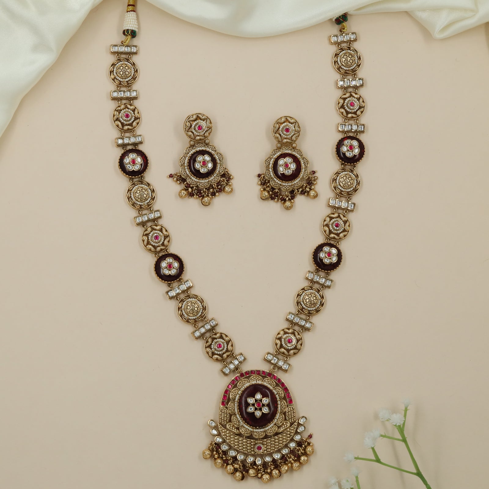 Glide Disc Kundan Long Haara with Repeating Floral Connectors