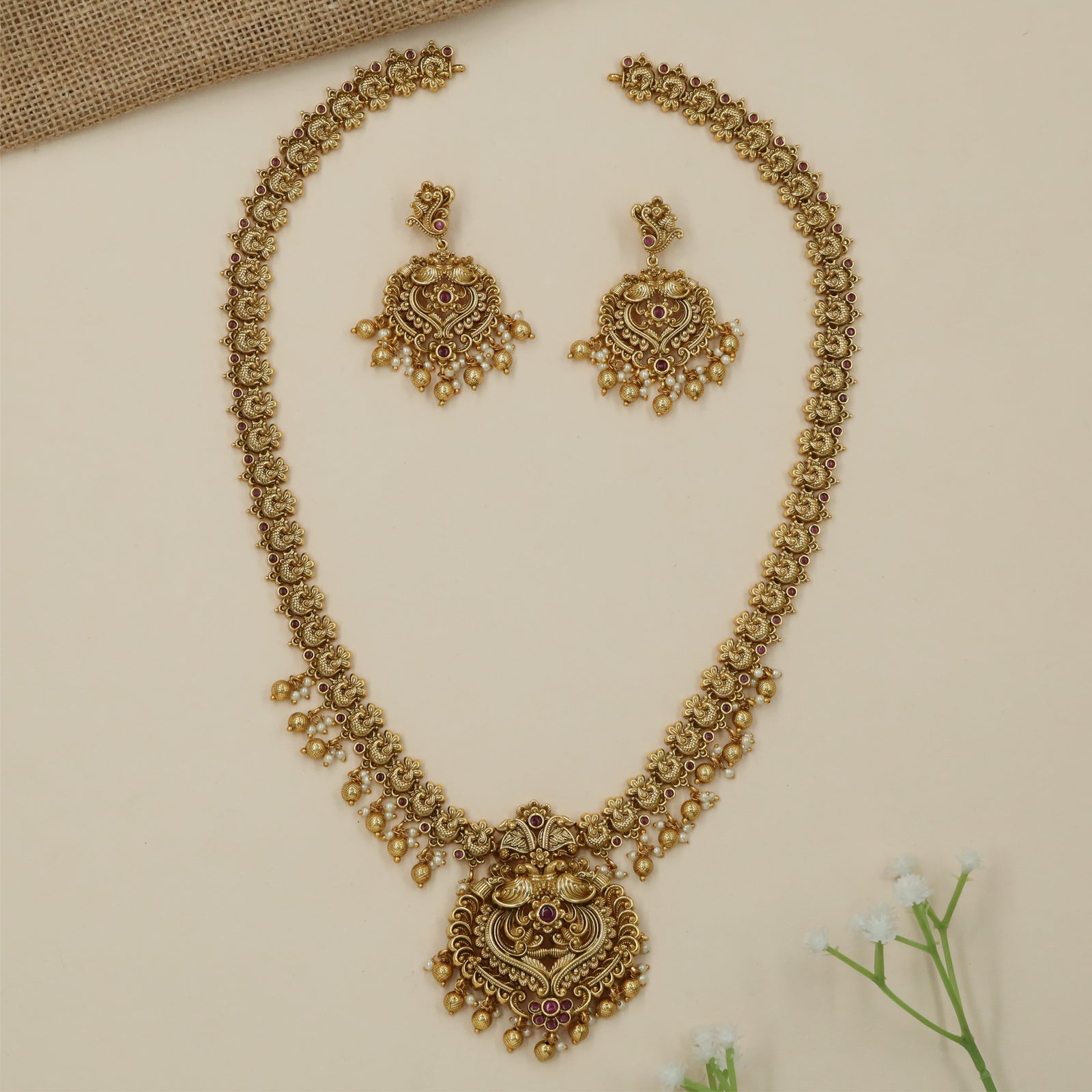 Opulent Floral Scroll Antique Long Haara with Sculpted Border Work