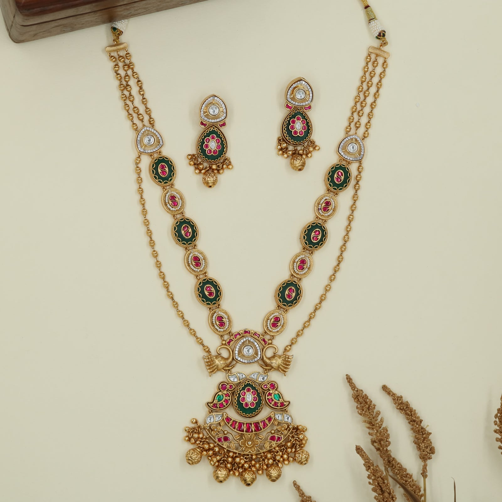 Connector panel kundan long haara with dual strands and temple style pendant