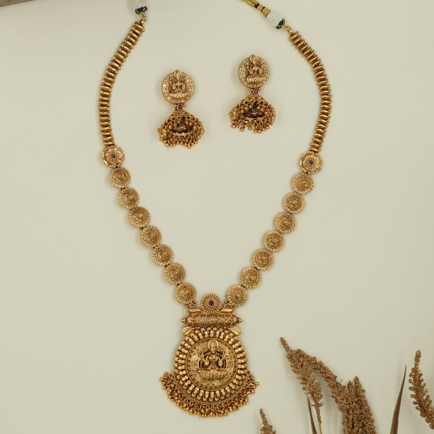 Floral coin sequence antique long haara with Lakshmi pendant detail