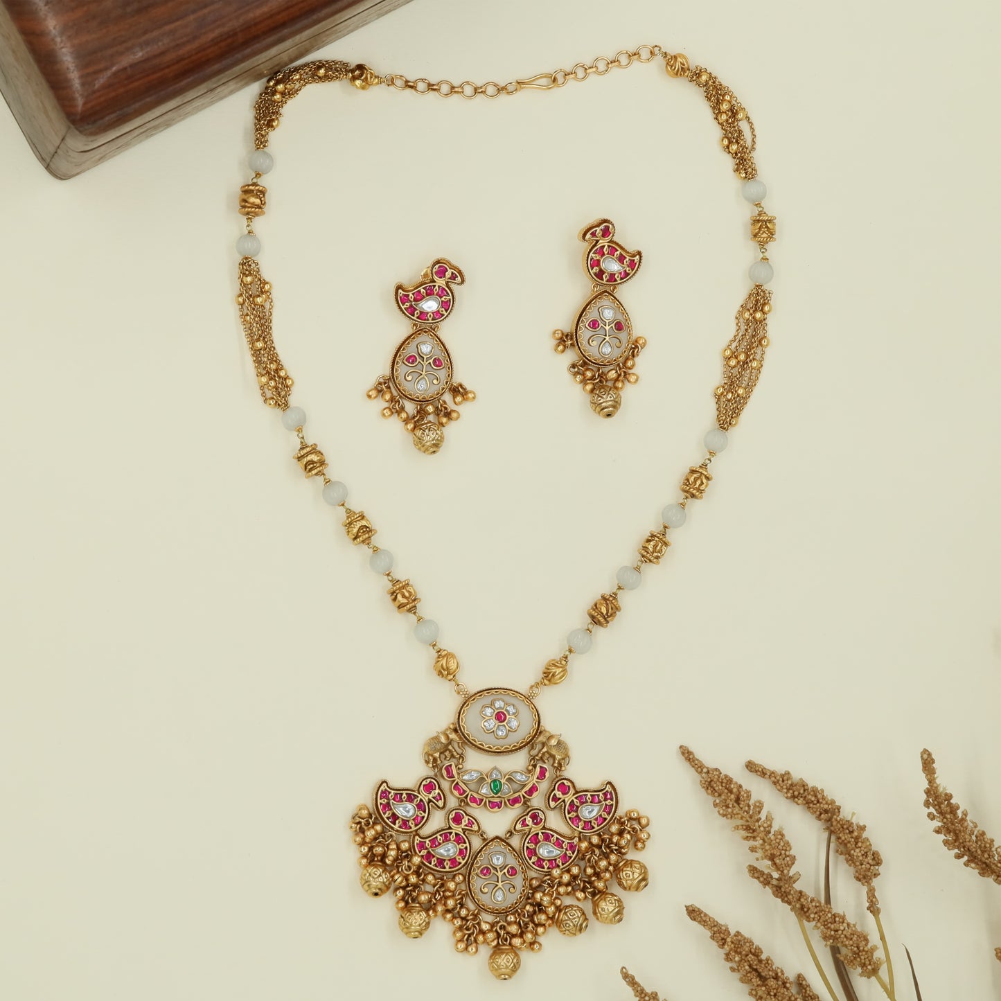 Swan panel kundan long haara with segmented beads and layered drop pendant