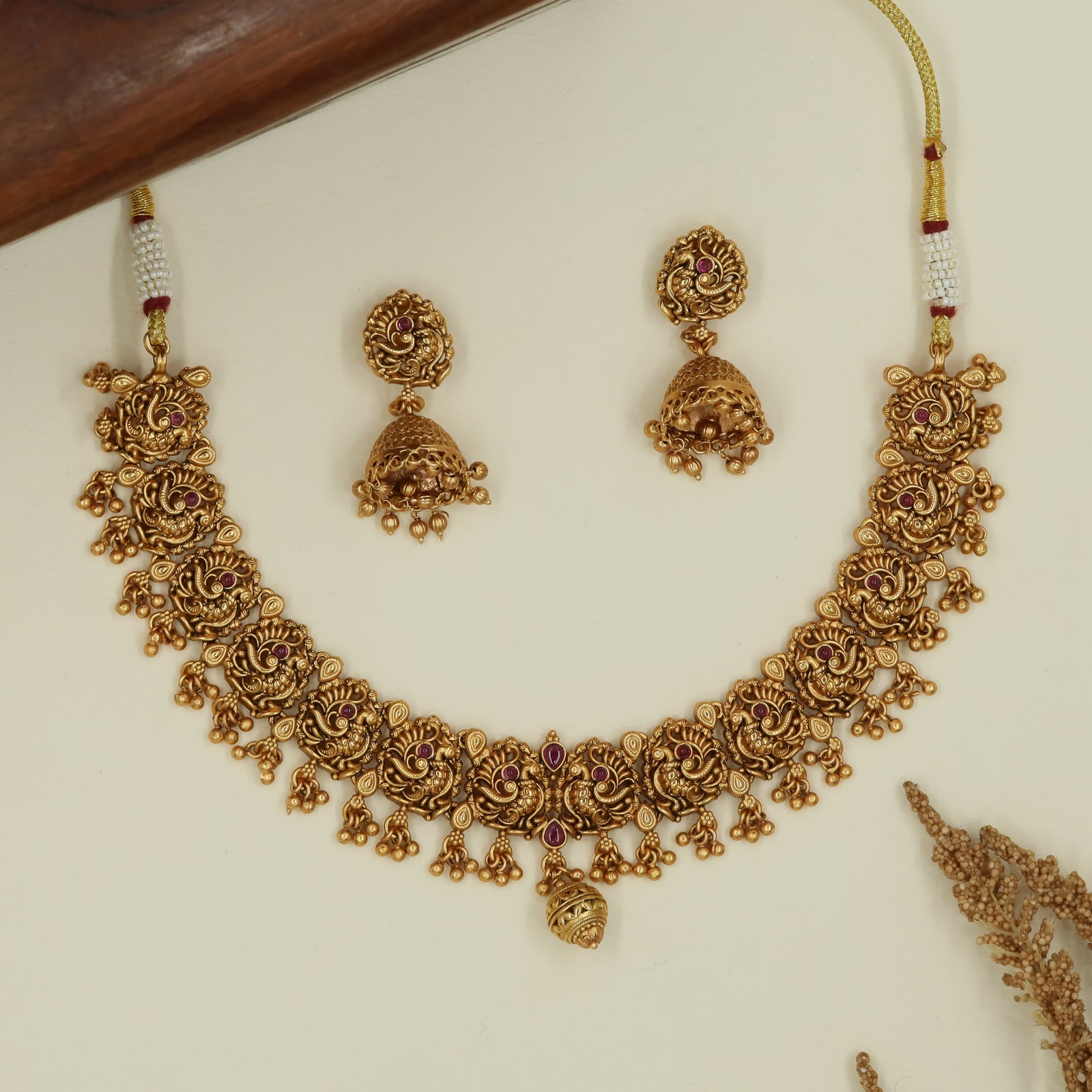 Rosette panel antique necklace with embossed floral units and bead fringe