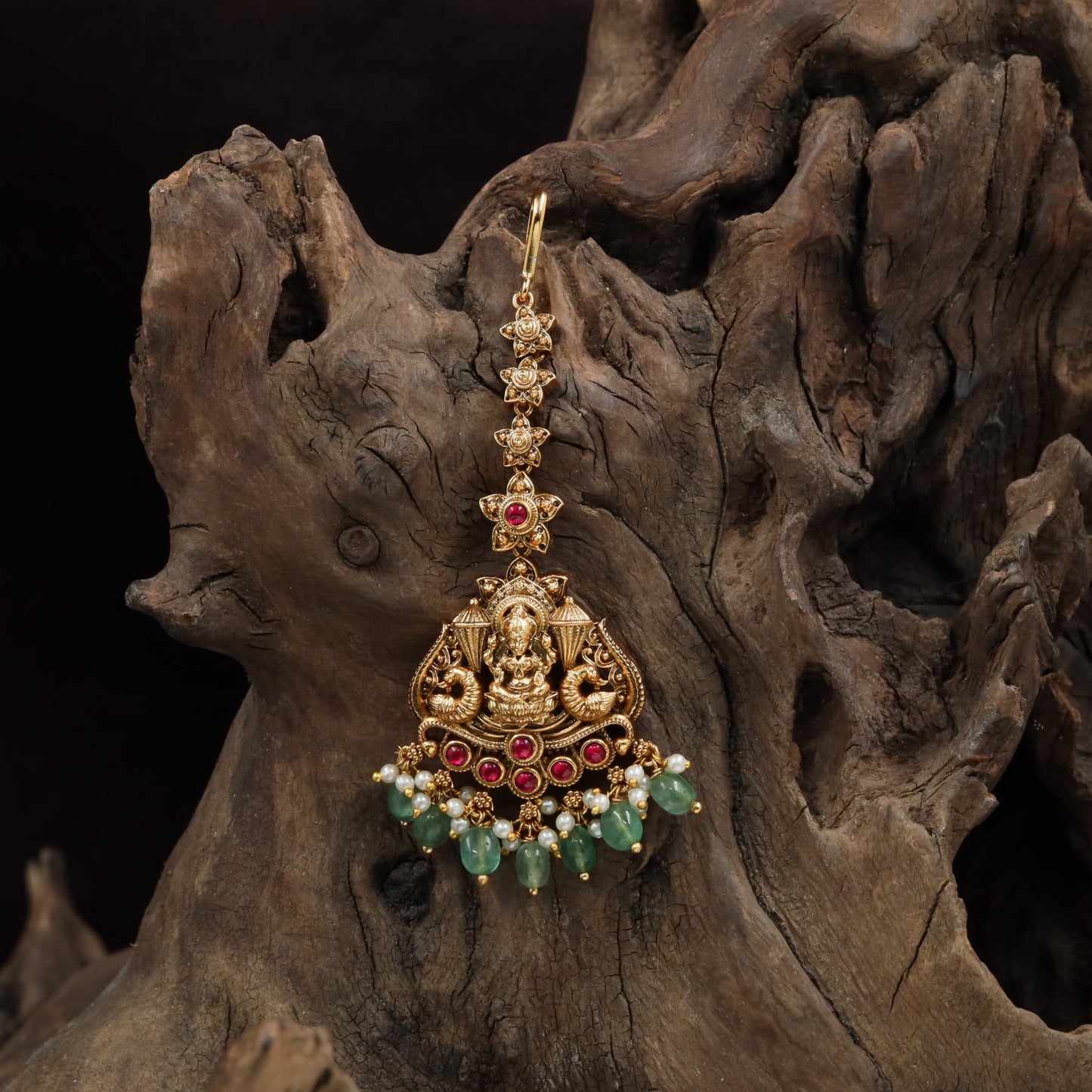Vertical chain tikka with sculpted Lakshmi pendant and arc base with hanging bead clusters