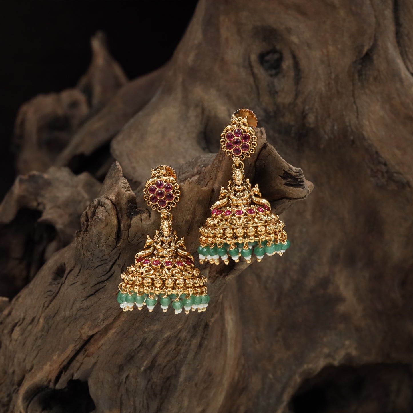 Floral stud jumka with deity link and multi tier dome with hanging bead rows