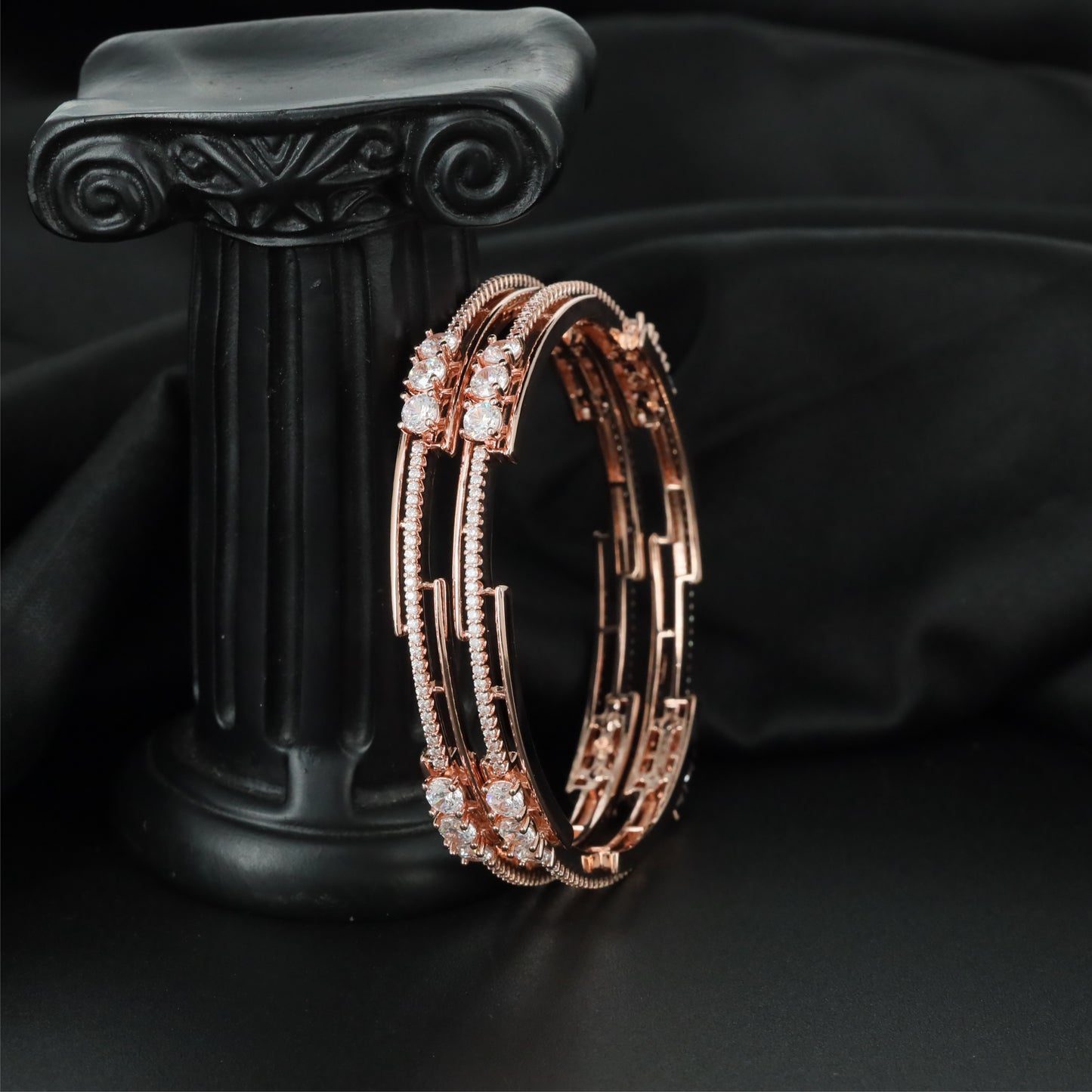Framework Bloom Rose Gold Bangles with Continuous Rail Pattern