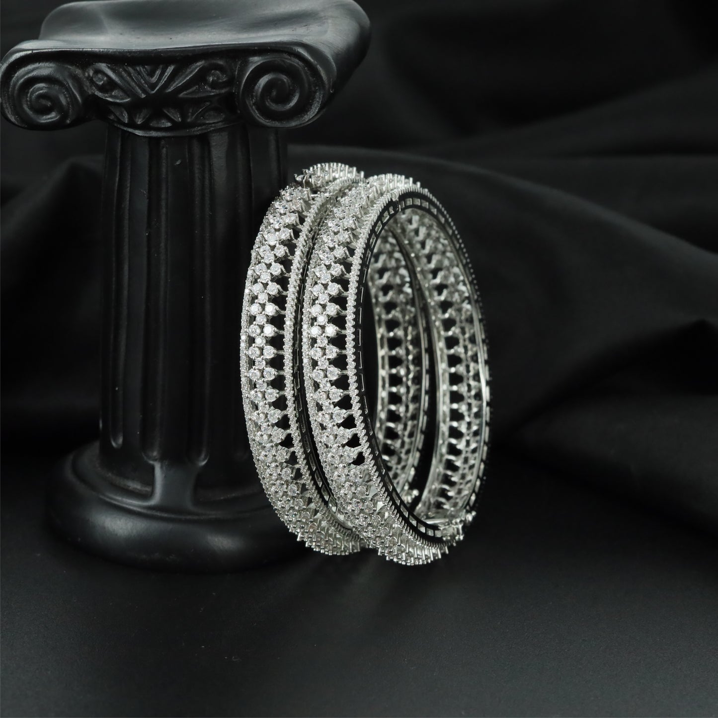 Elite Border Track Rhodium Bangles with Intricate Open Sections