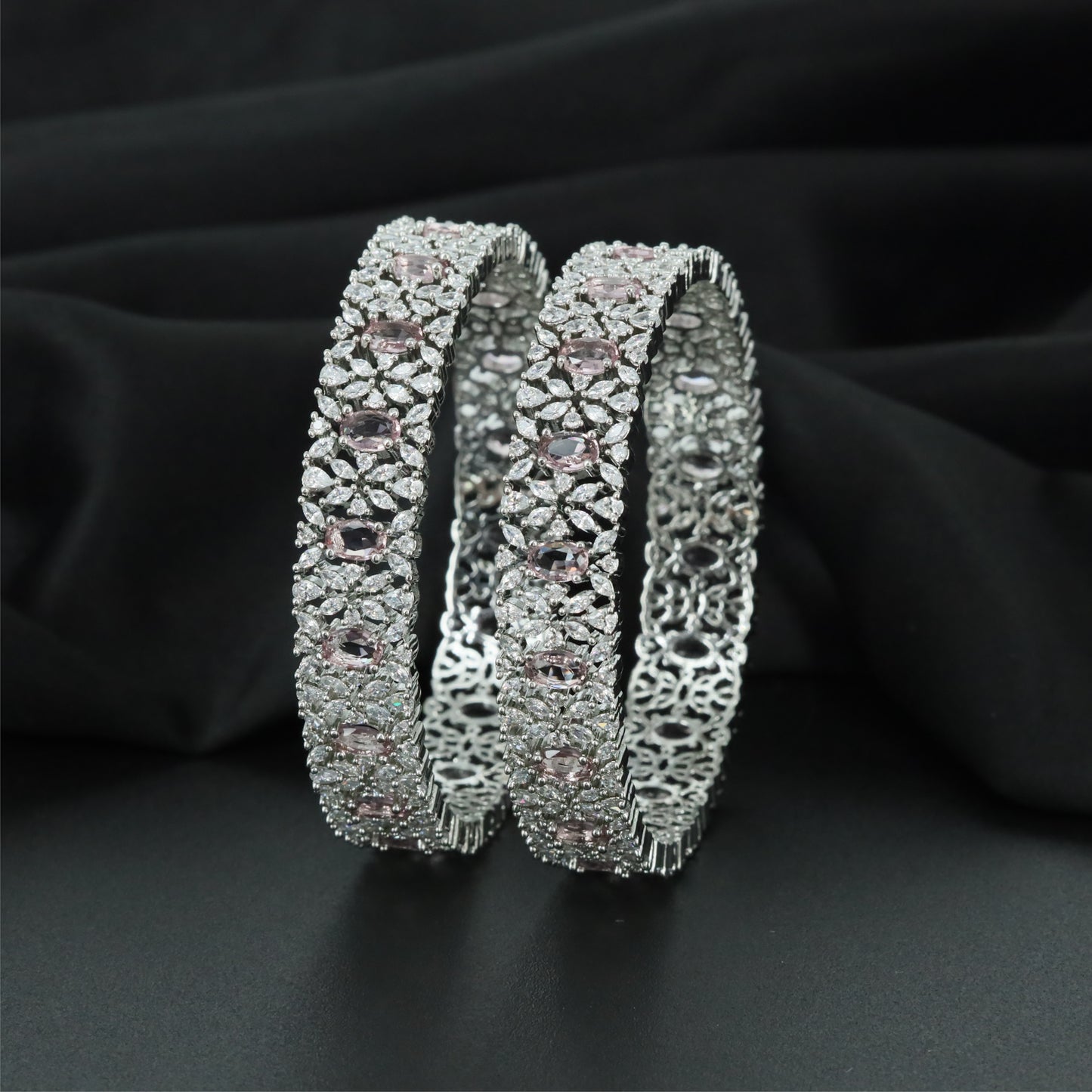 Festive Ribbon Rhodium Bangles with Decorative Surface Arrangement