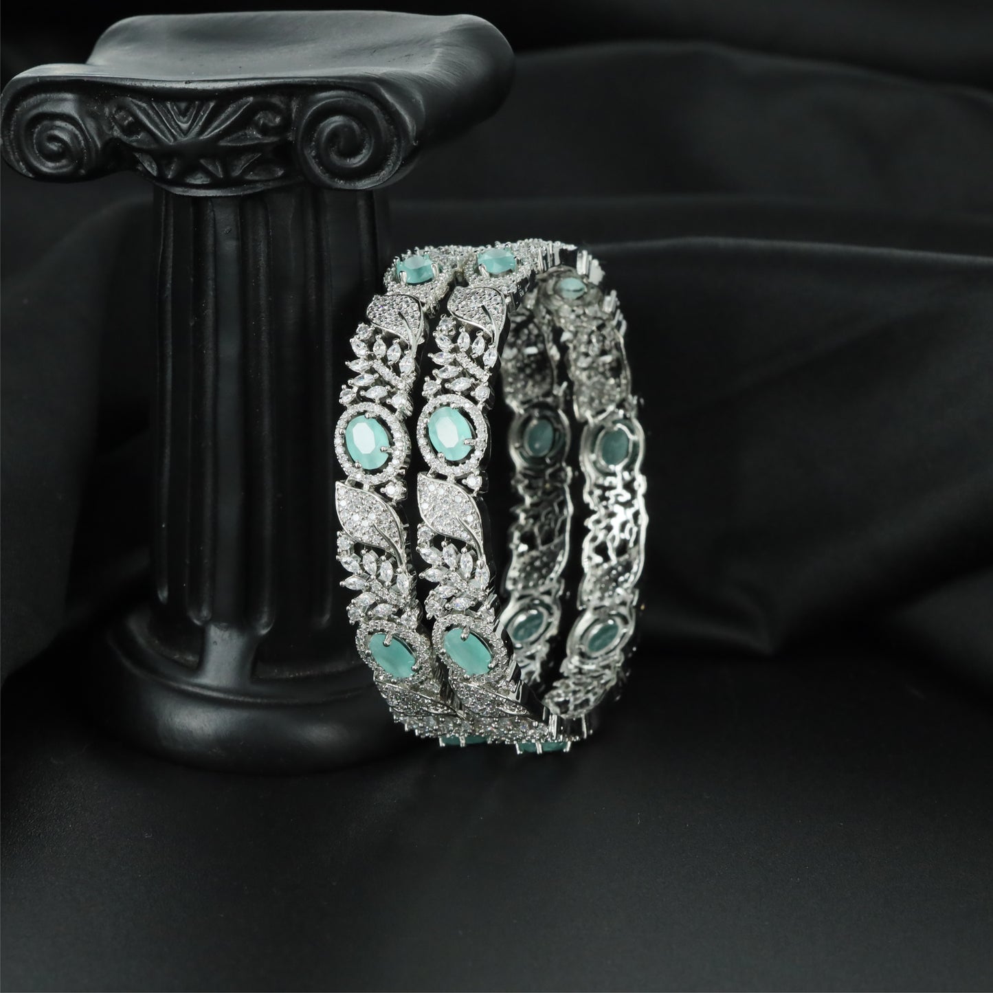 Nature Inspired Rhodium Bangles with Curved Leaf Arrangement