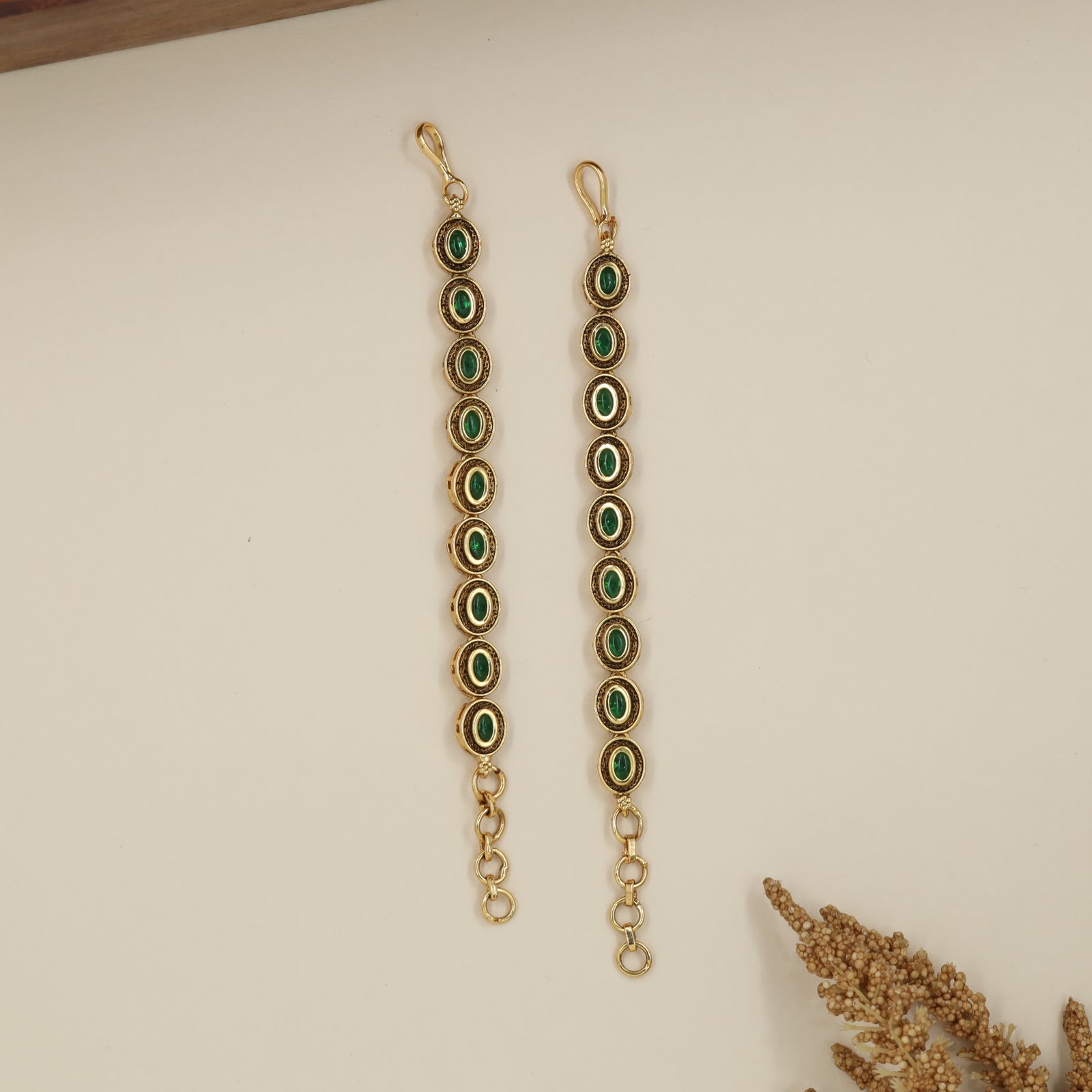 Ornate Vertical Oval Mati with Traditional Connector Design