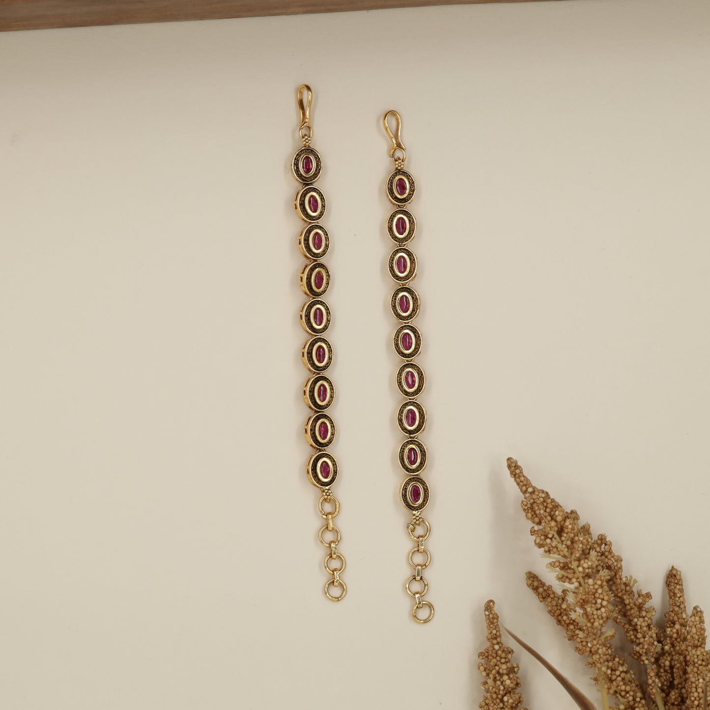 Ornate Vertical Oval Mati with Traditional Connector Design